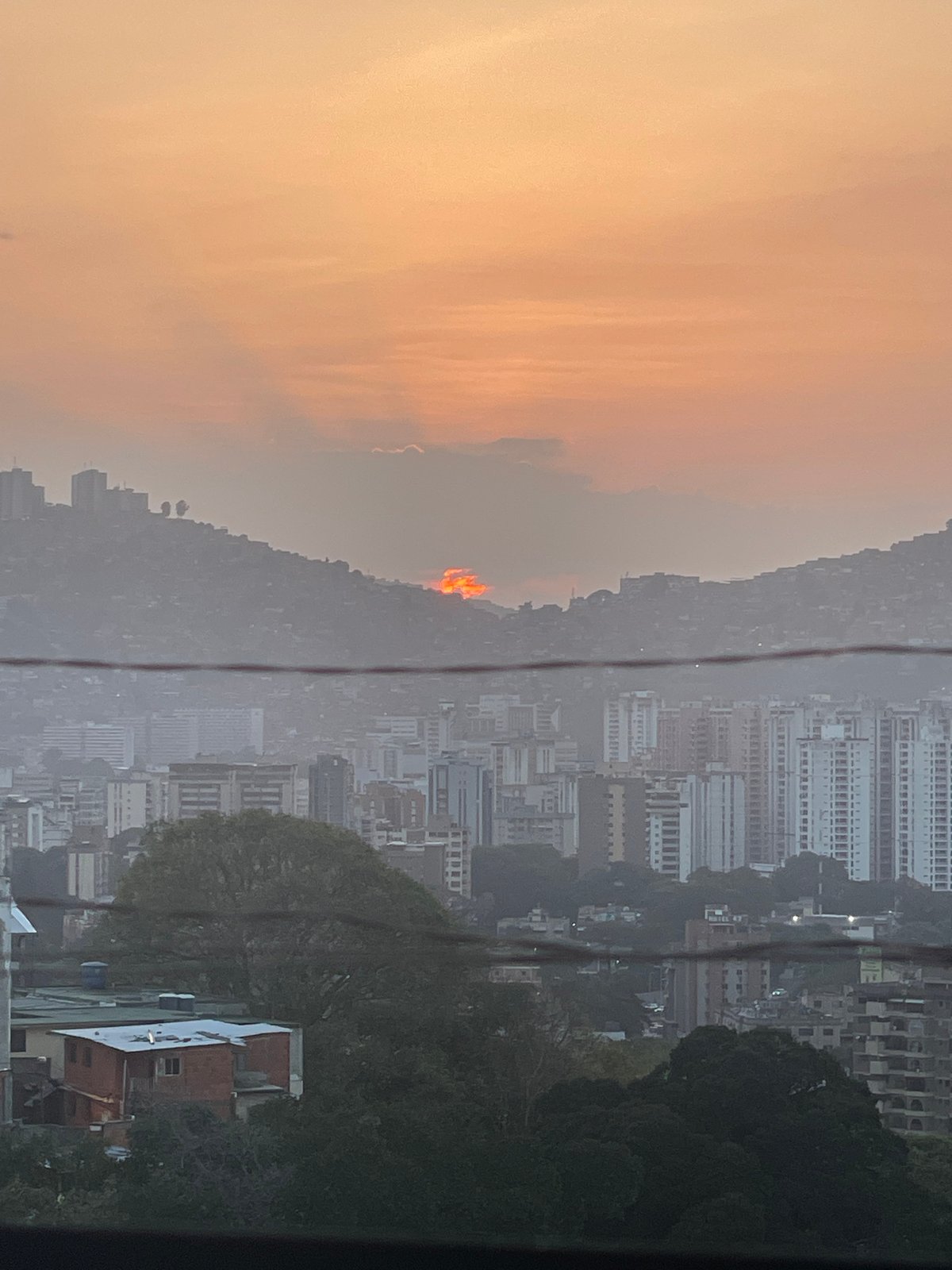 Elevated sunset views captured over Caracas cityscape