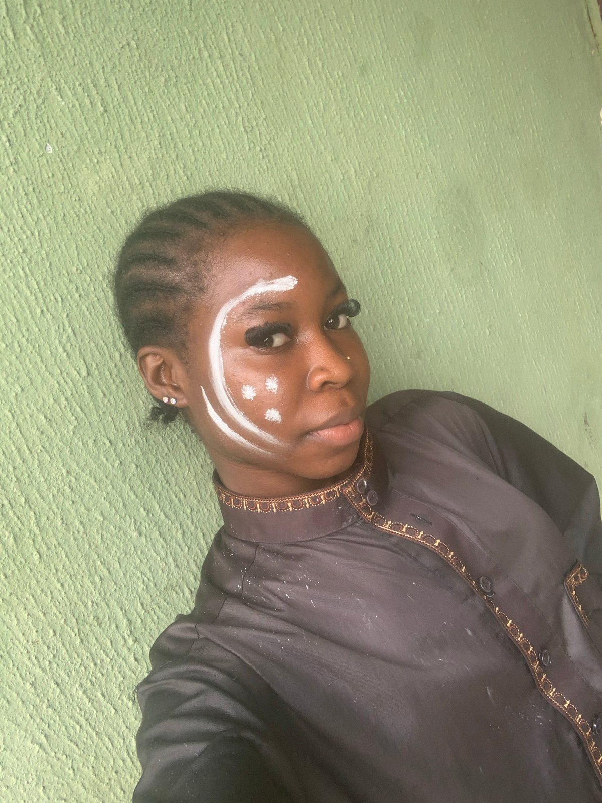 Styled portrait session with face paint, Ado, Nigeria
