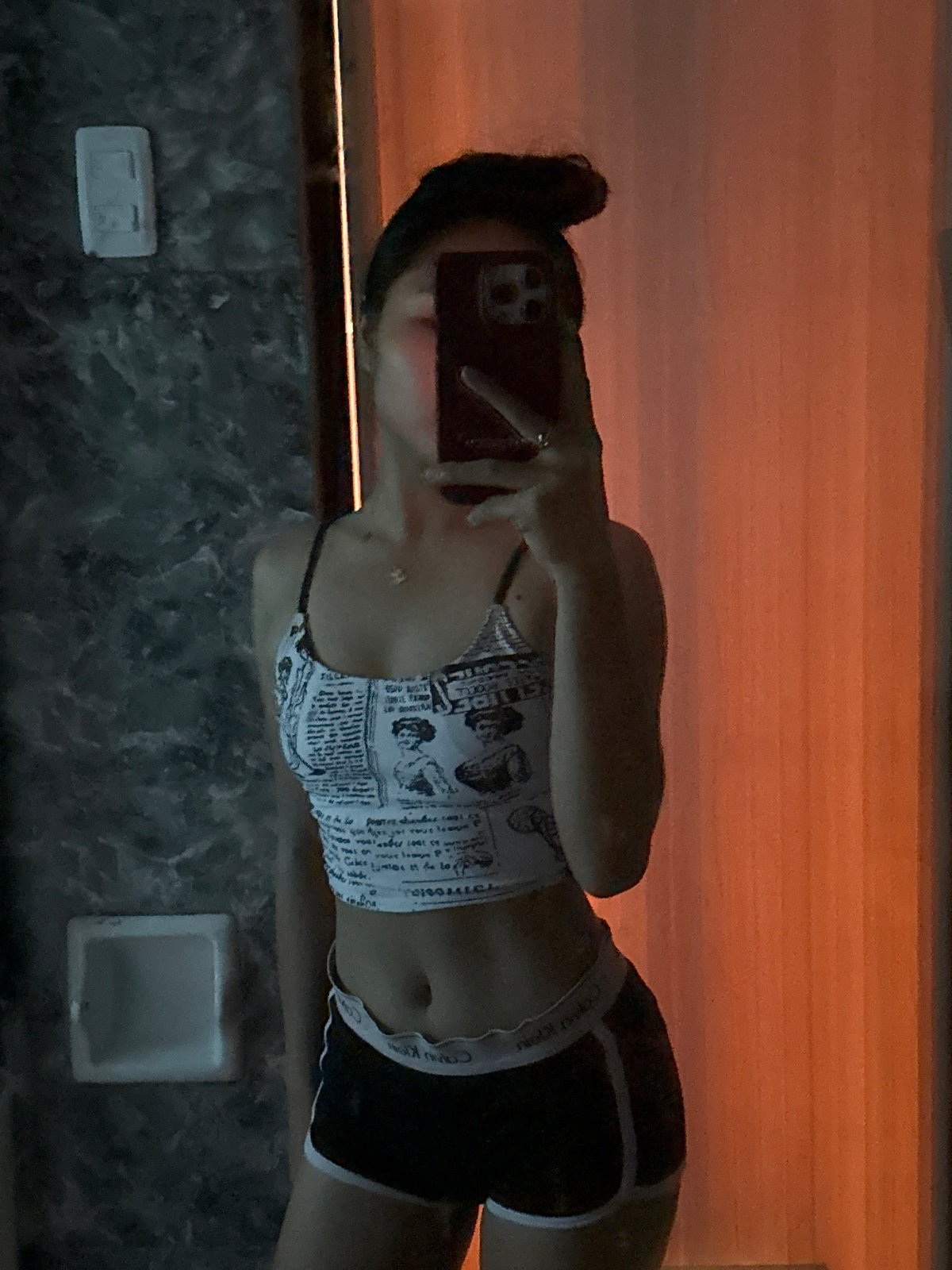 Person takes mirror selfie in Davao City early morning