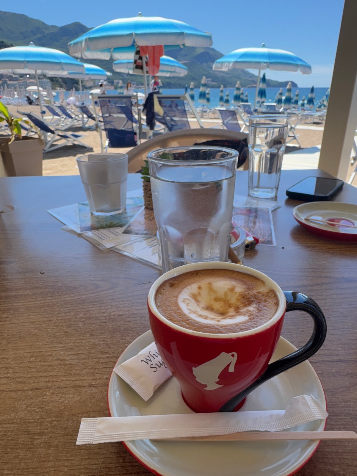 Morning coffee and beach setup in Boreti, Montenegro