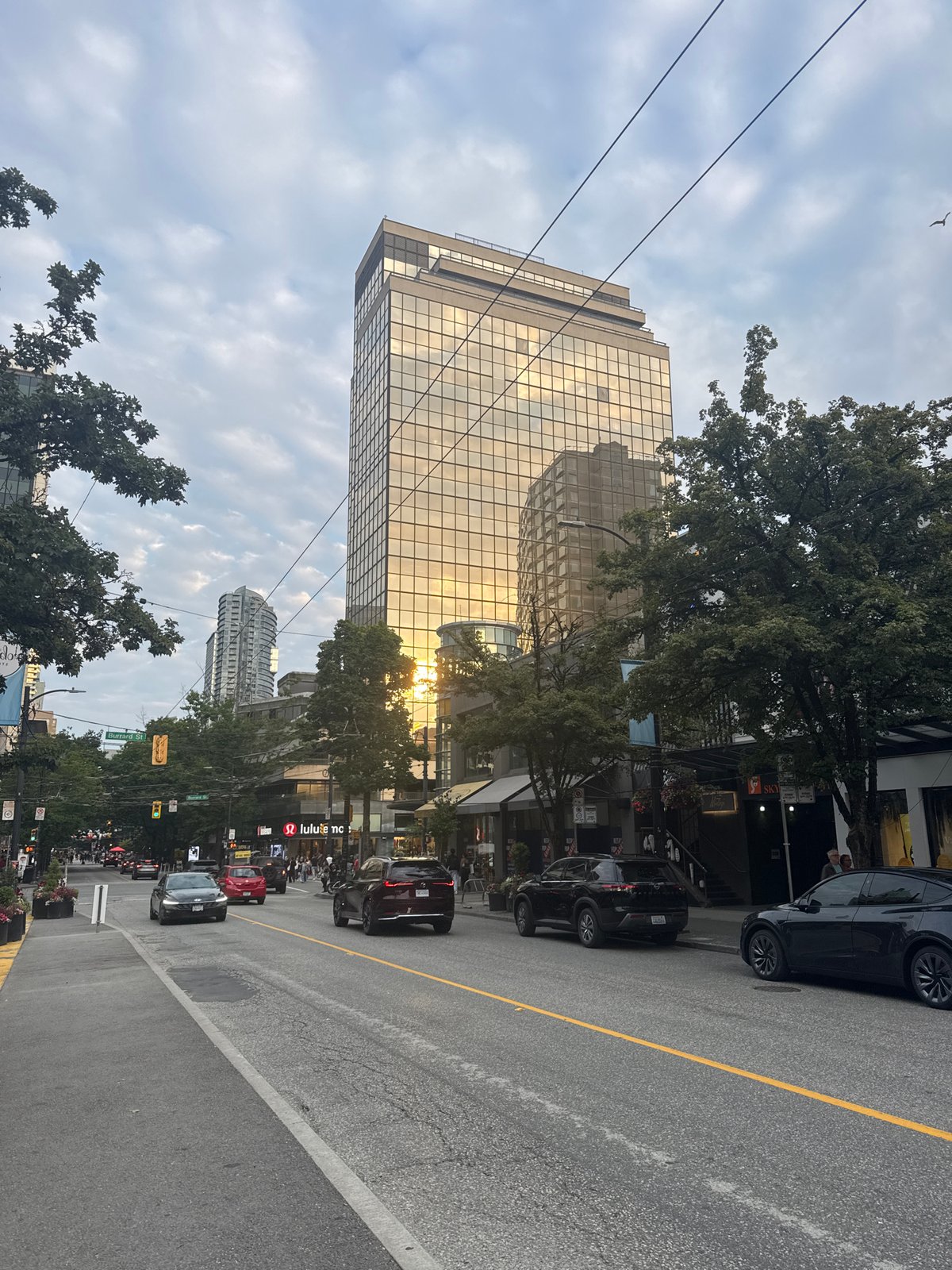 Downtown Vancouver at dusk, from luxury retail to plaza life