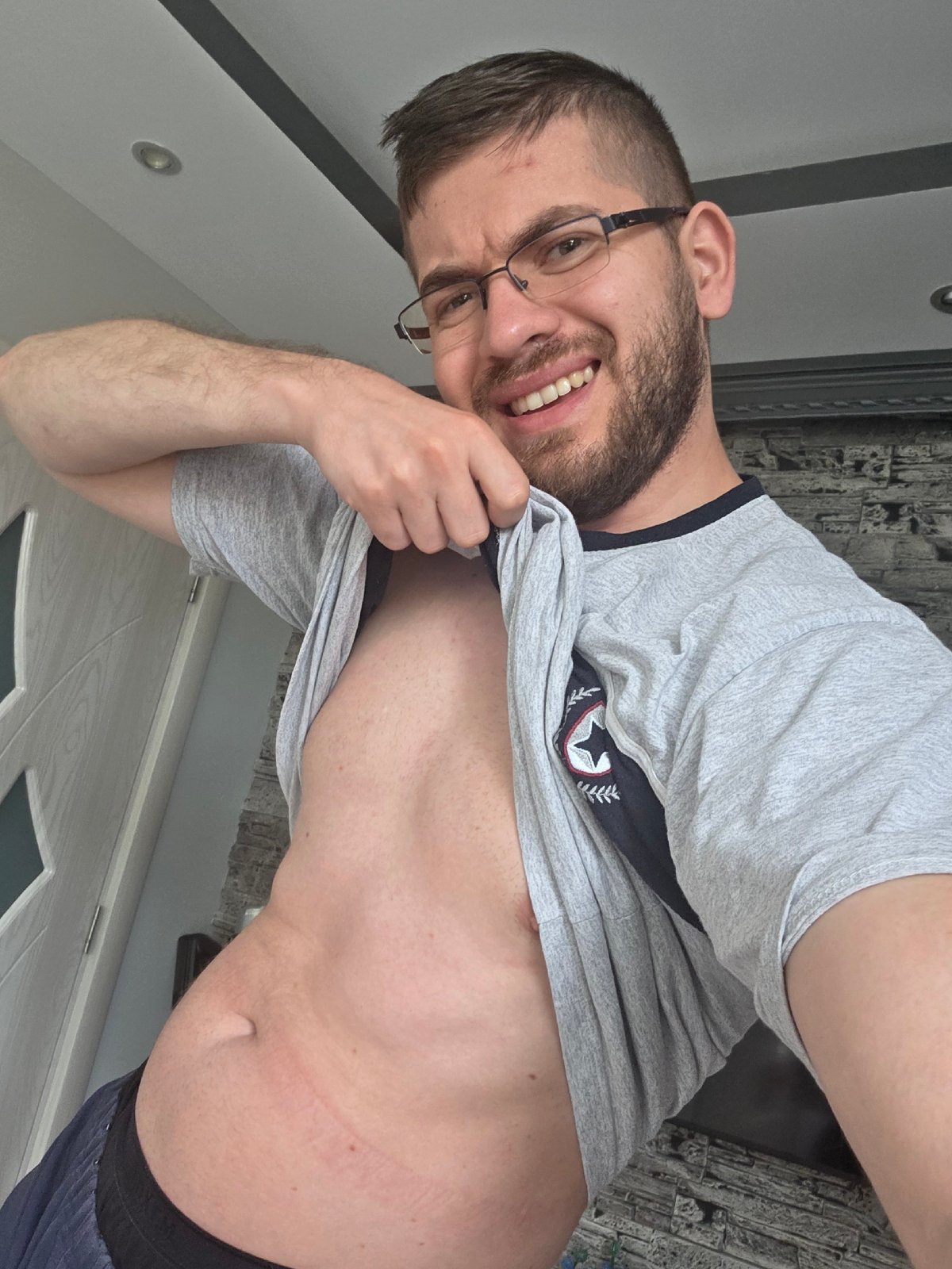 Man displays emblemed t-shirt in Bulgarian village