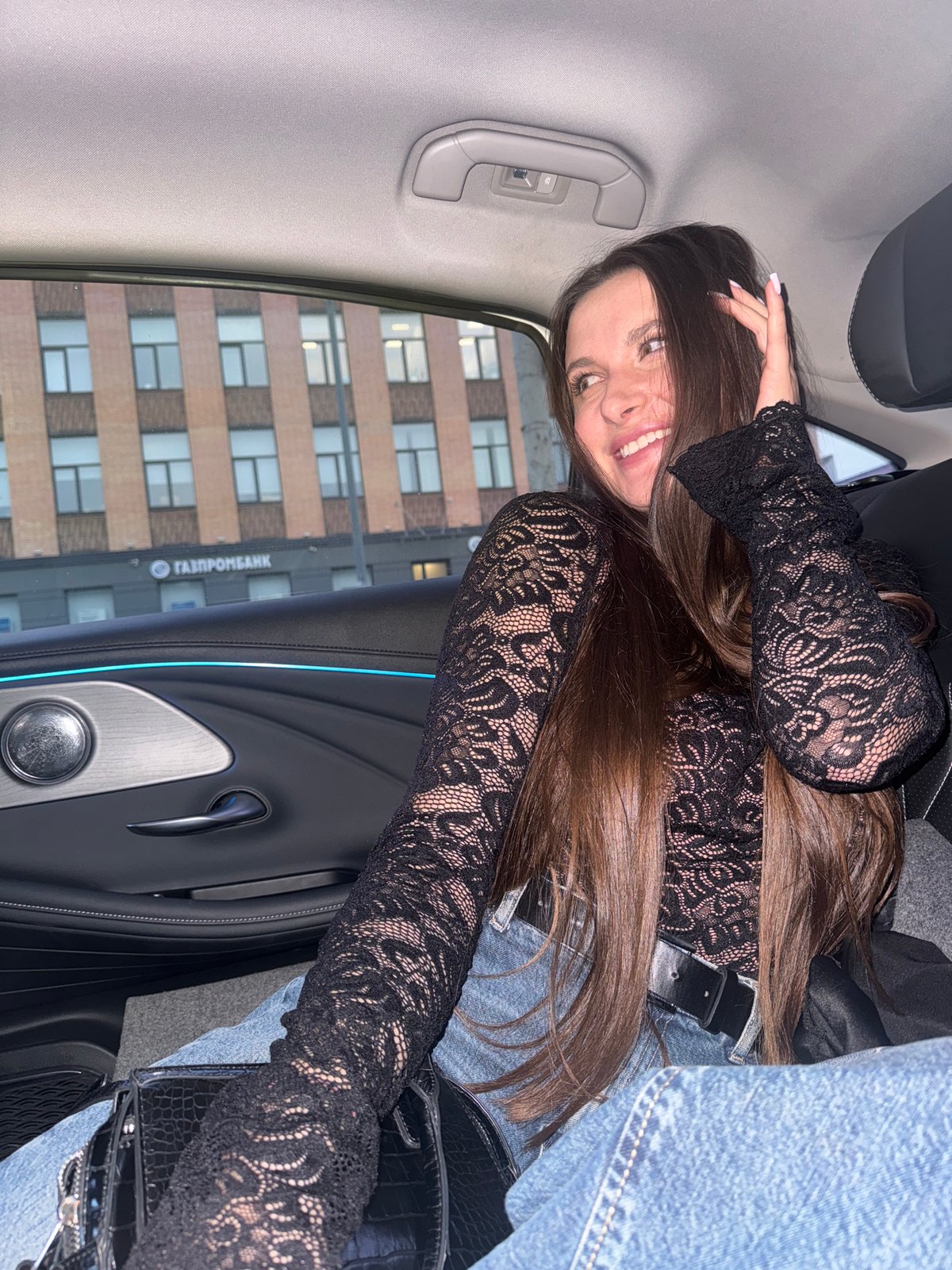 Woman photographed in car near Gazprombank building in Odintsovo