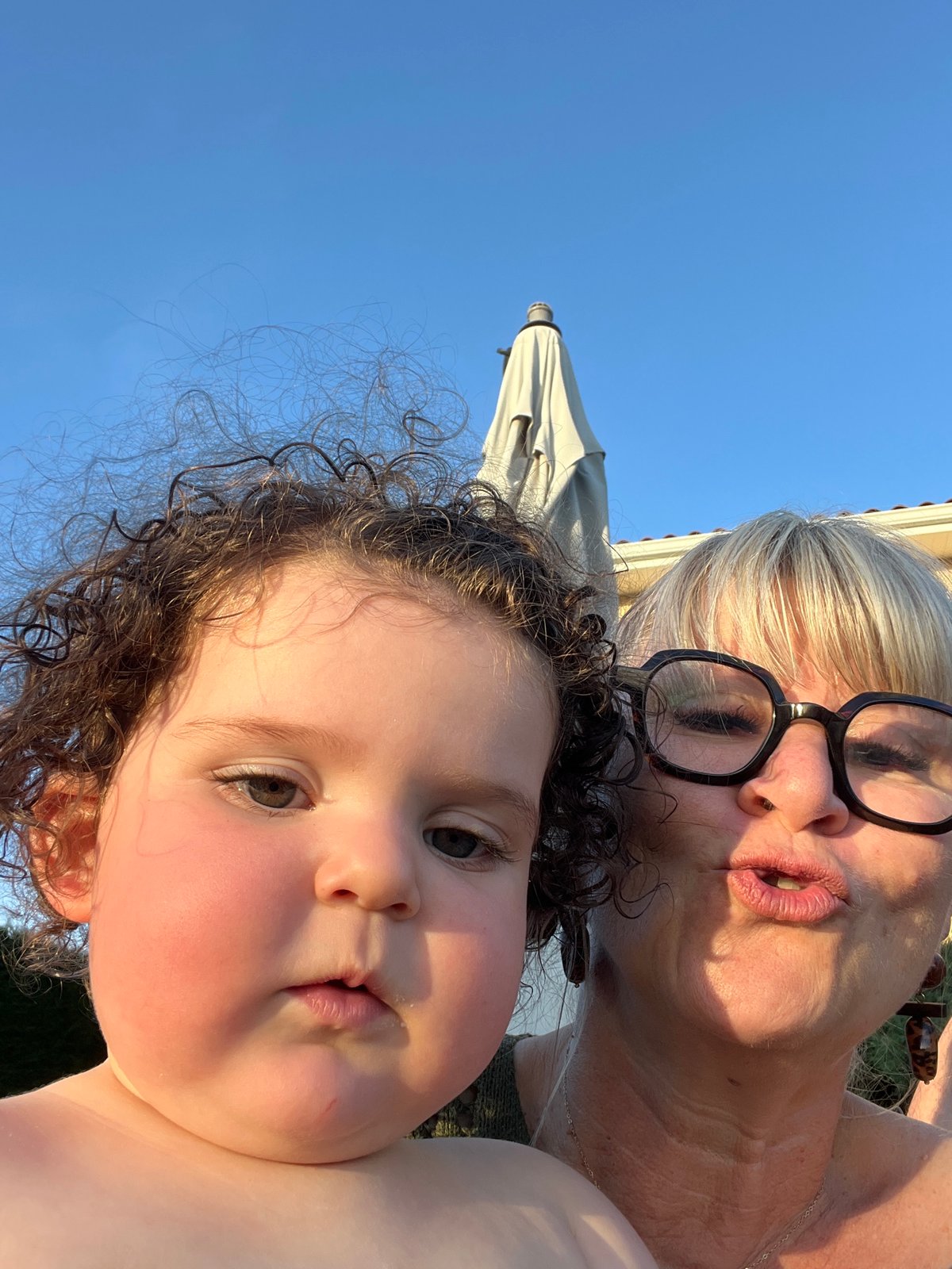 Summer family pool gathering in Saint-Galmier, France