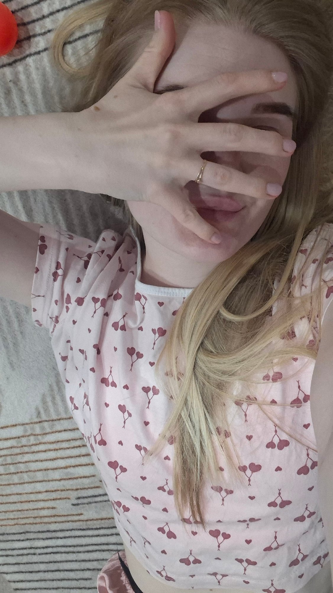 Woman Takes Playful Selfie Series With Candy in Russian City