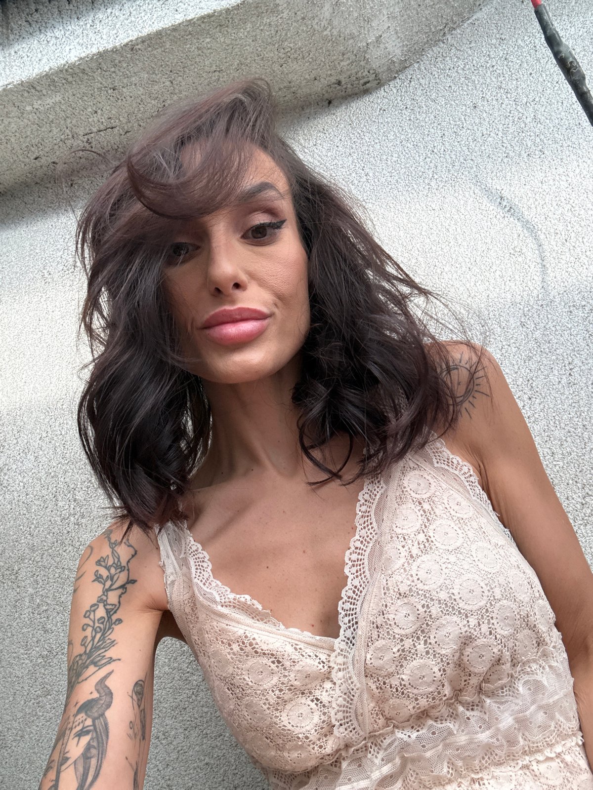 Woman photographed in multiple outfits during afternoon in Pleven