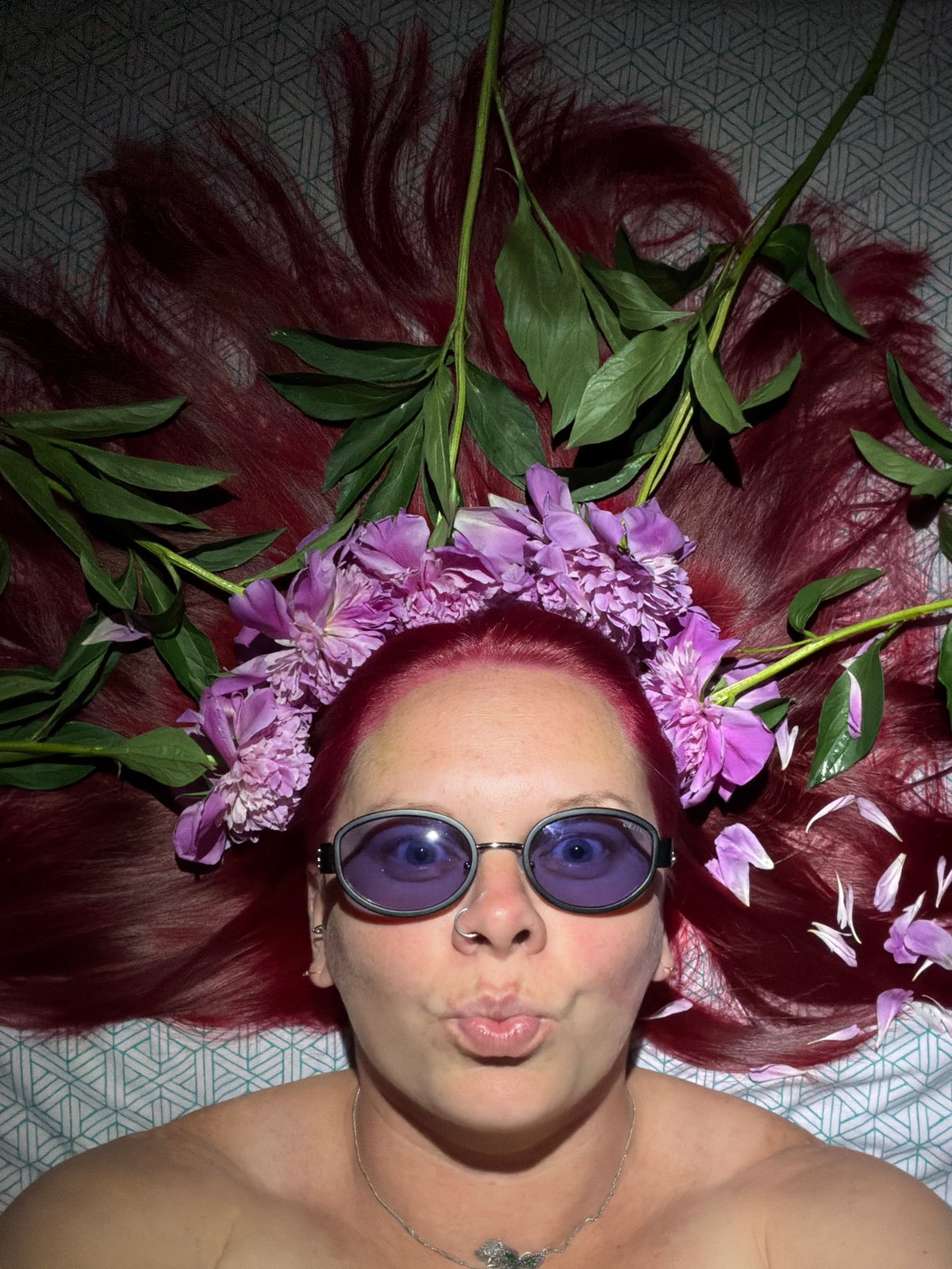 Orange-haired individual documented through daily activities in Chaikovsky, Russia