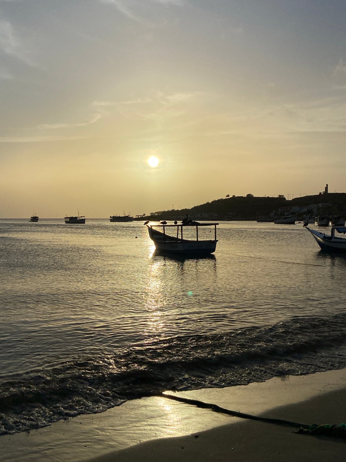 Evening in Juan Griego: bay, boats, streets, and town life
