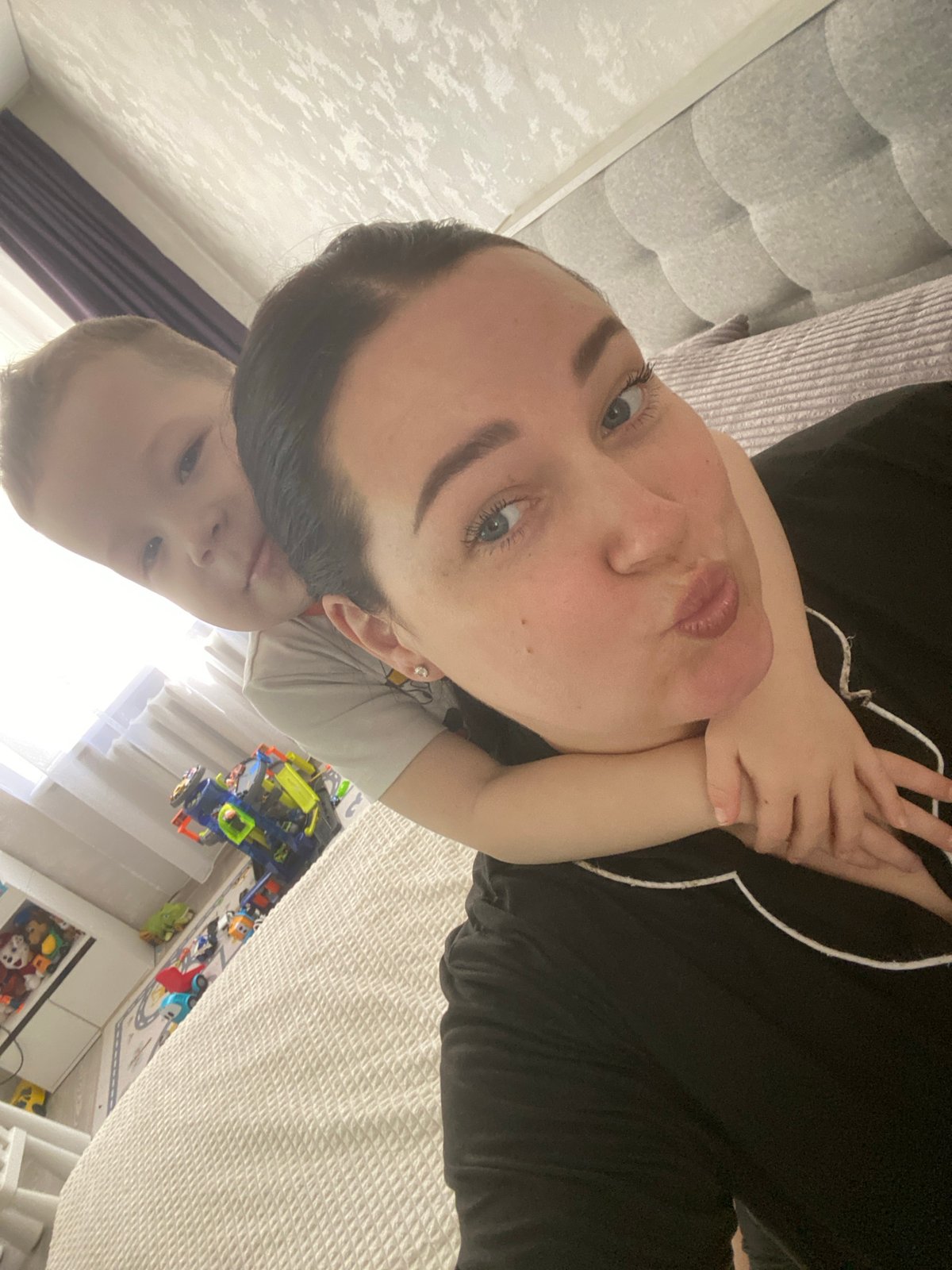 Mother and child share quiet morning moments in Sochi home