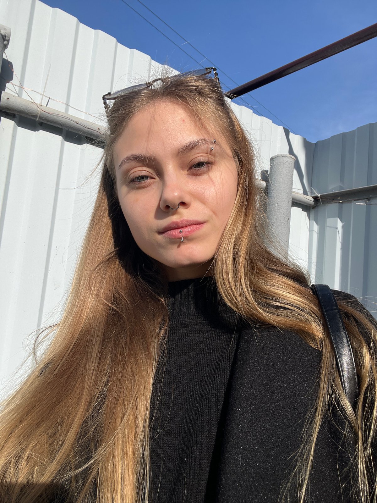 Woman photographed outdoors in sunlight in Foki, Russia