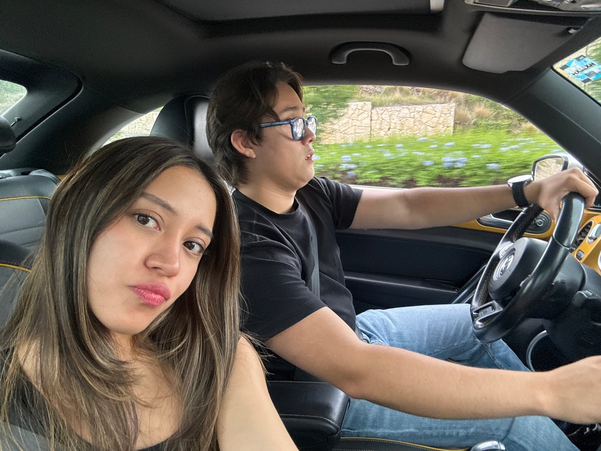 Couple takes selfies in car in Santa Clara Ocoyucan