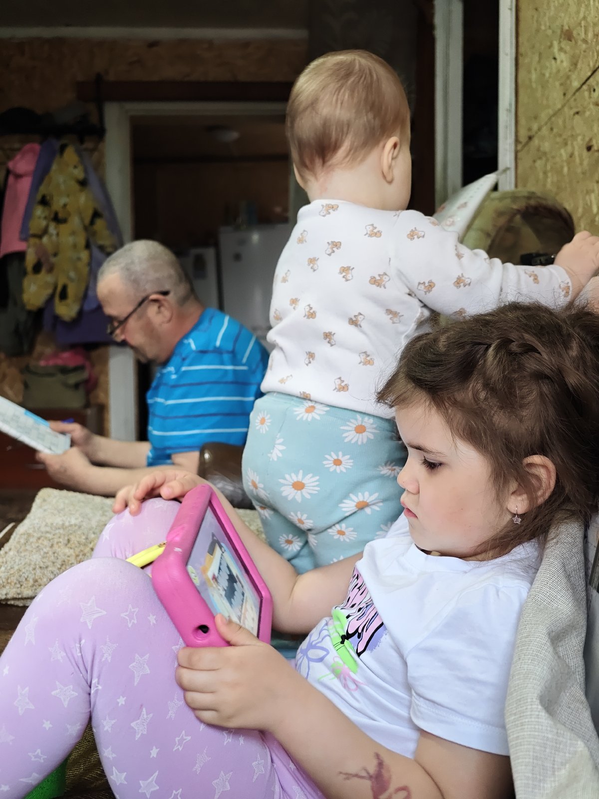 Family mealtime and play documented in Russian household