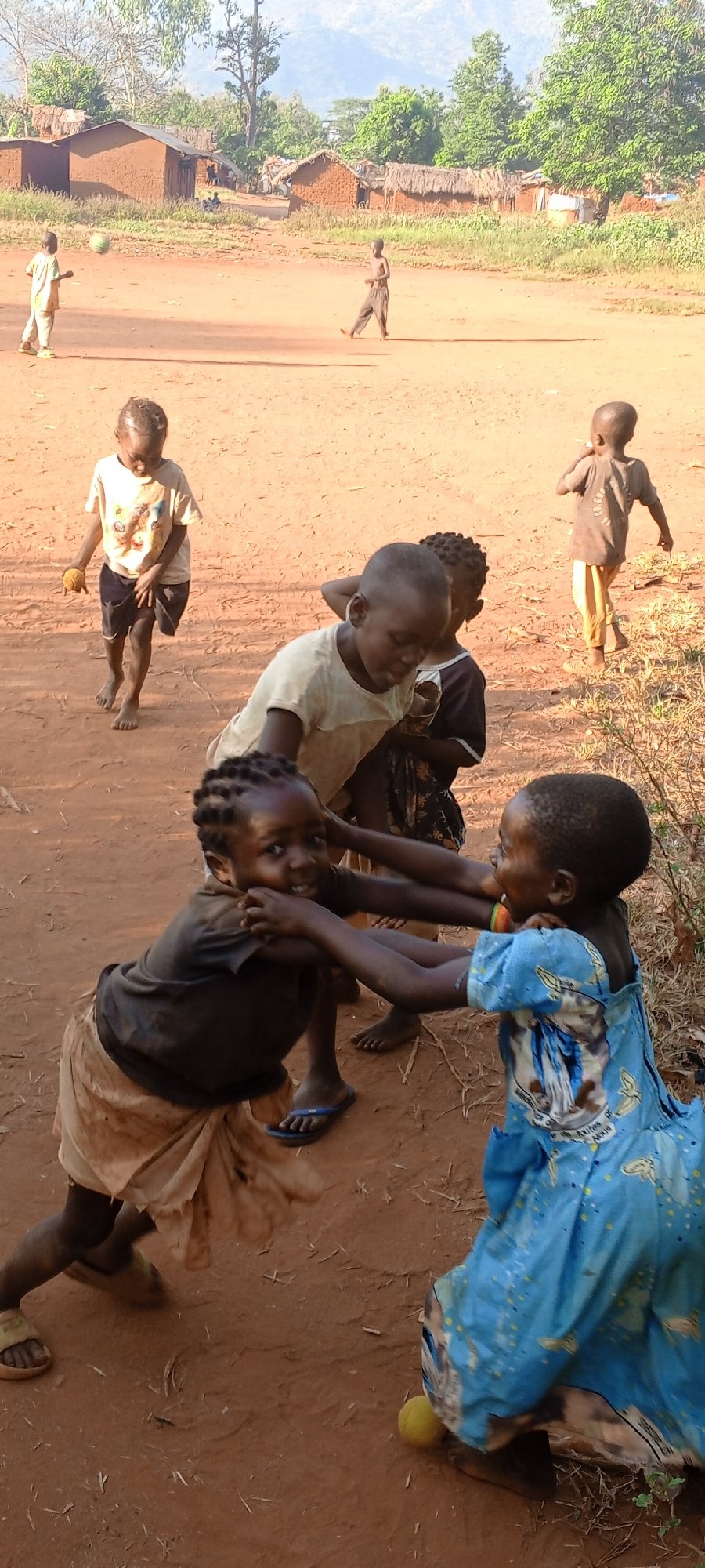 Children play games in rural Congolese village of Ngalula