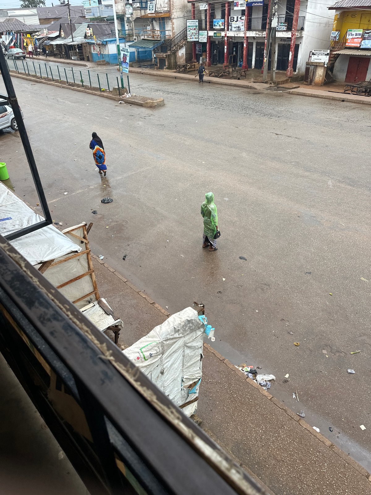 Rainy morning street life in Bukuru, Nigeria