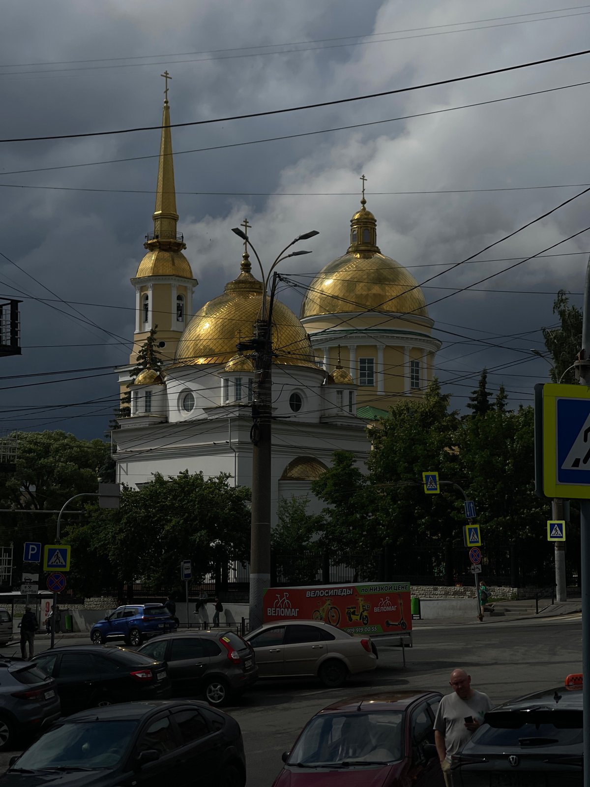 Inside a Russian bakery, golden domes visible outside