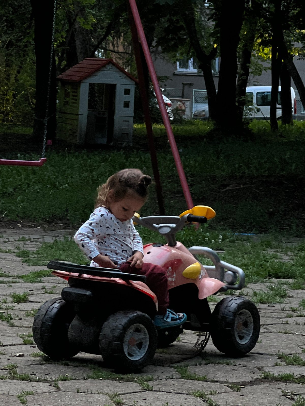Child plays on toy vehicles in Sofia park