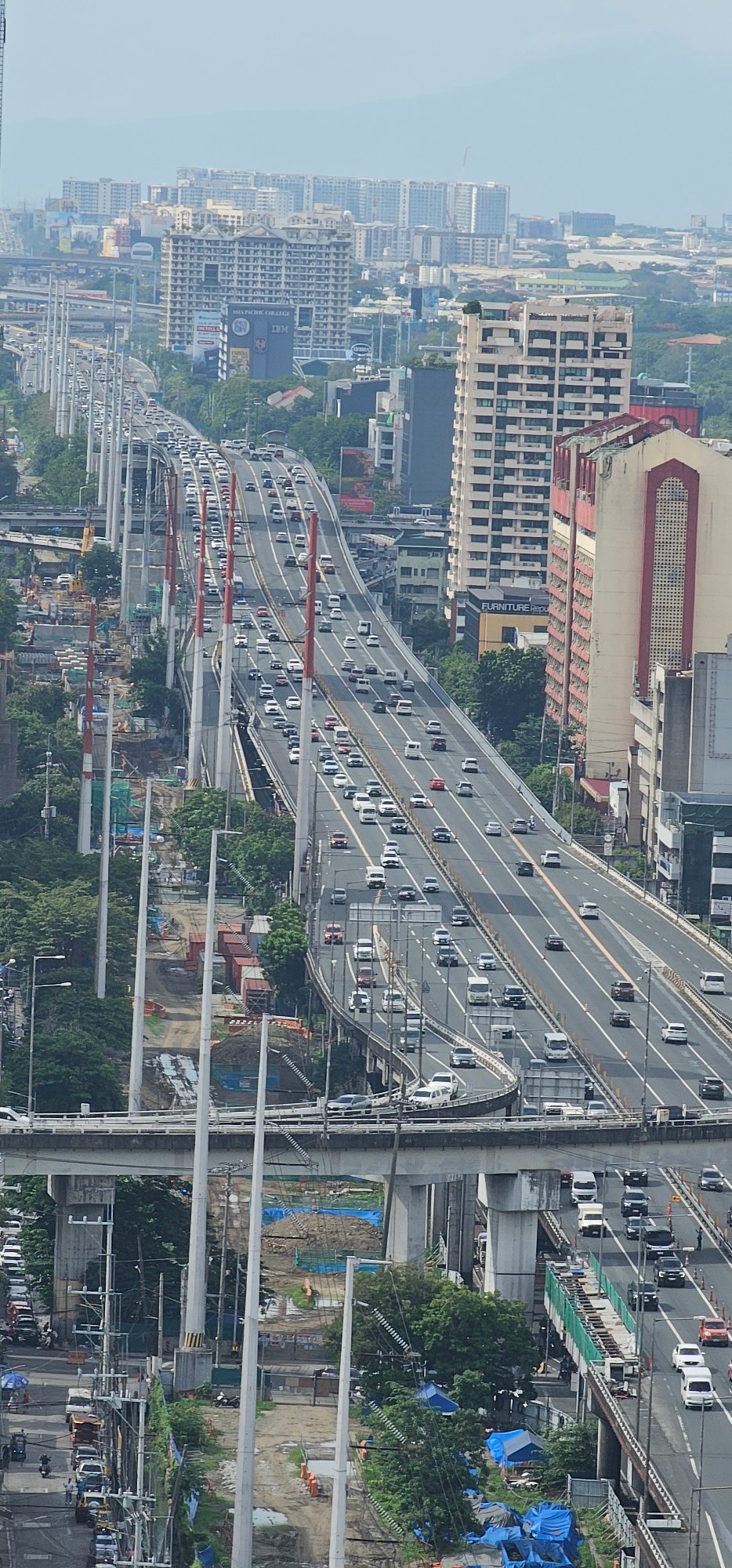 Makati streets and skyline, busy with morning traffic