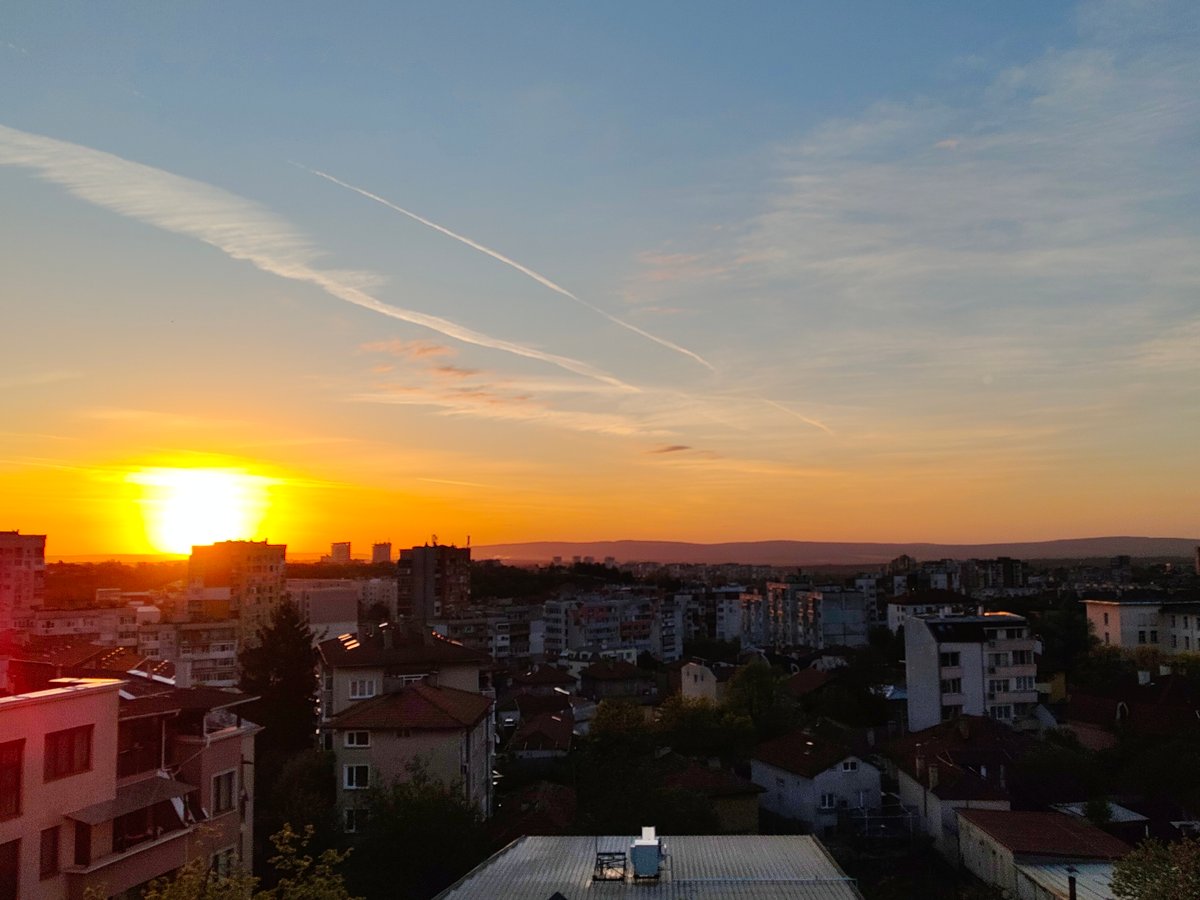 Sunset observed over Shumen, Bulgaria with contrails visible