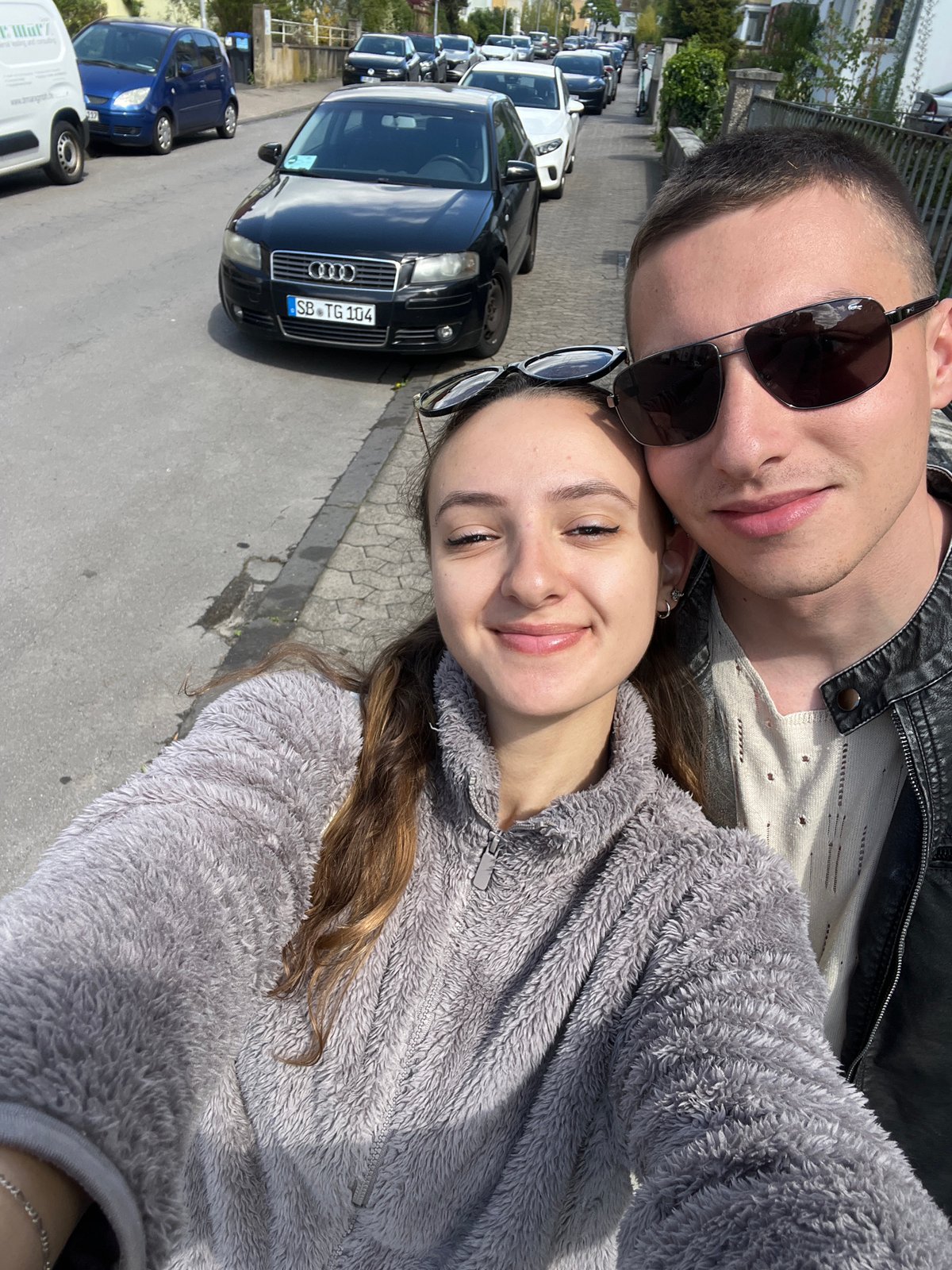Couple takes selfie on residential street in Saarbrücken
