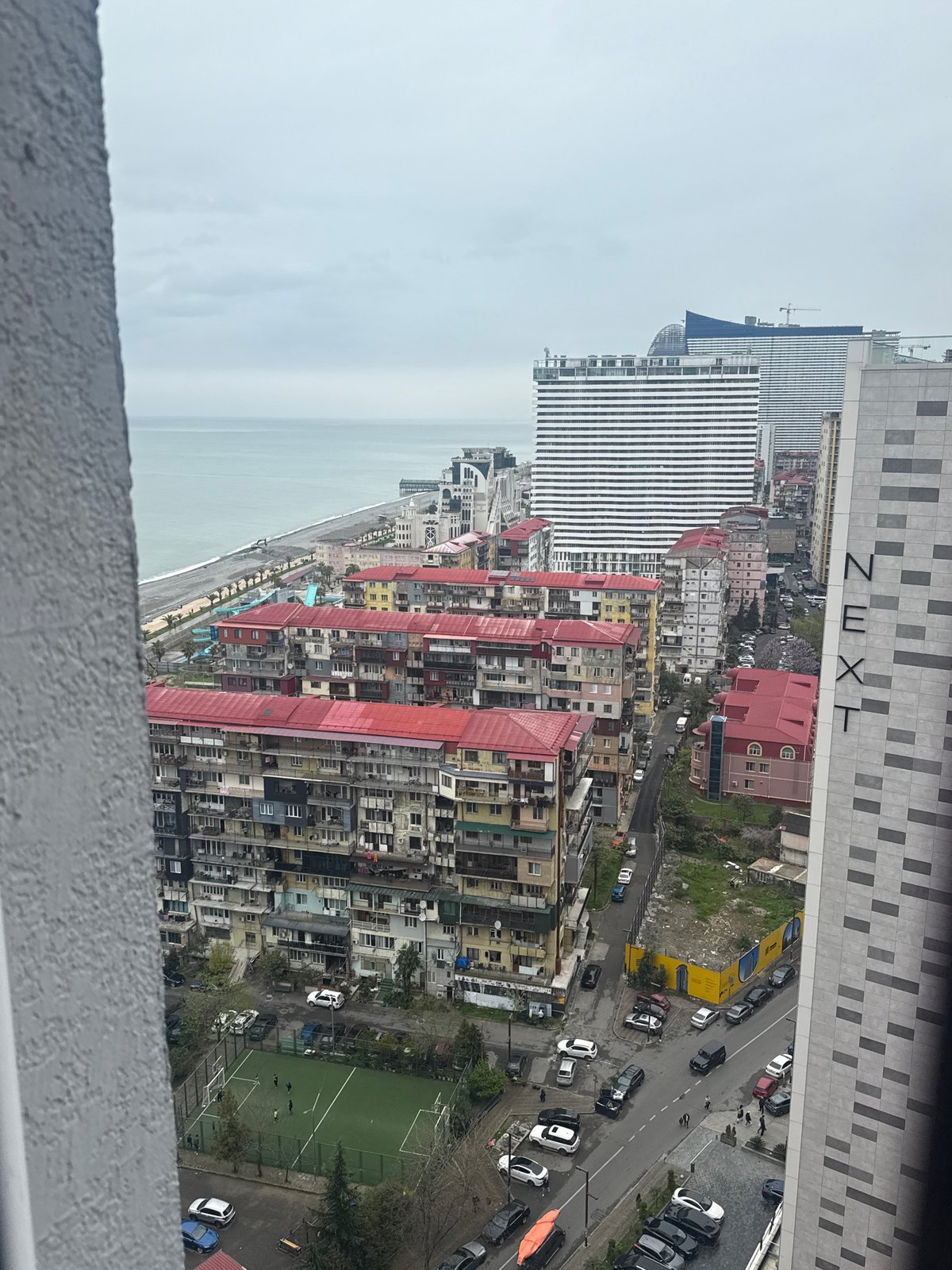 Aerial views document Batumi's coastal cityscape from elevated positions