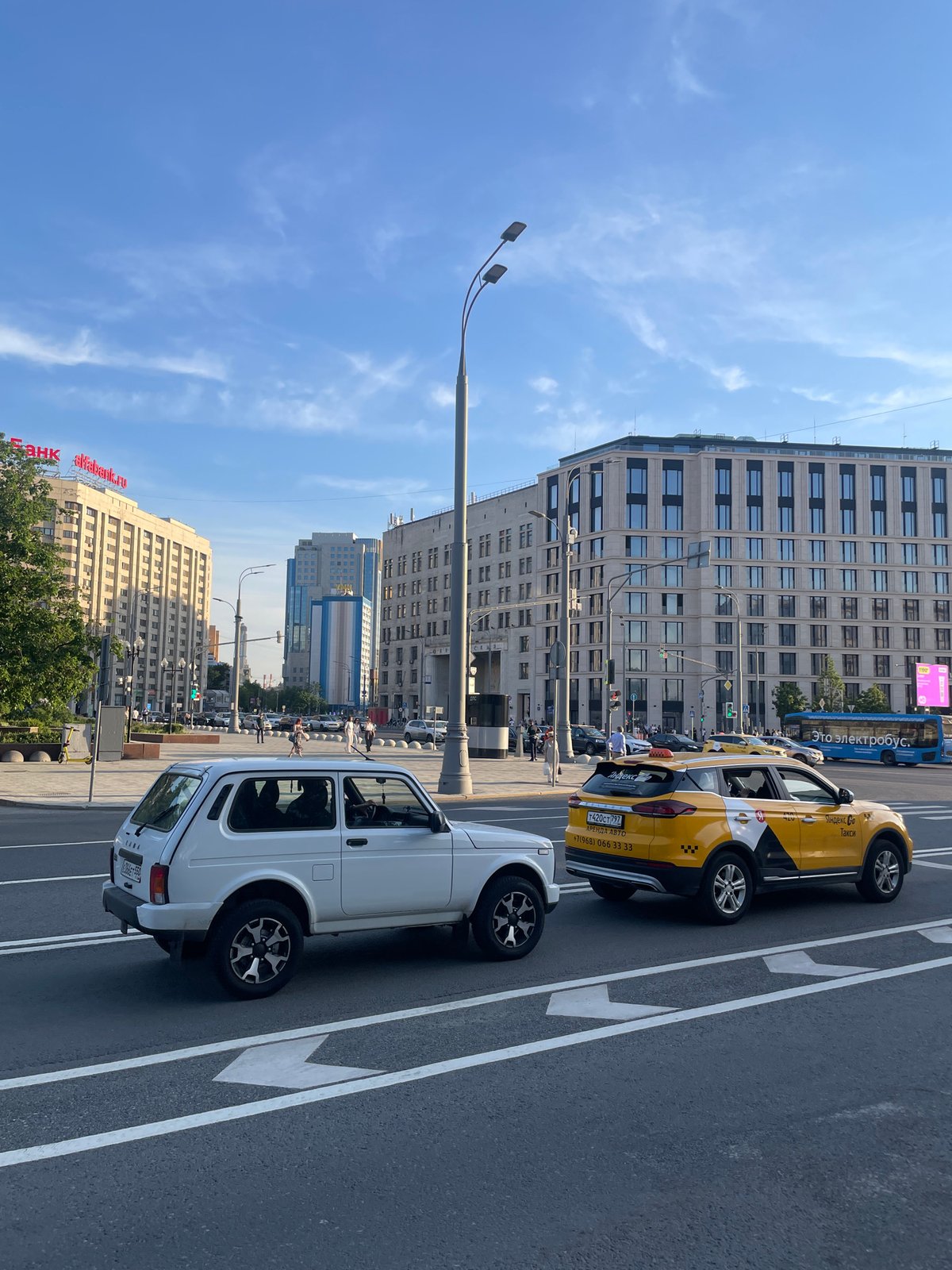 Moscow street scenes show parked cars and church architecture