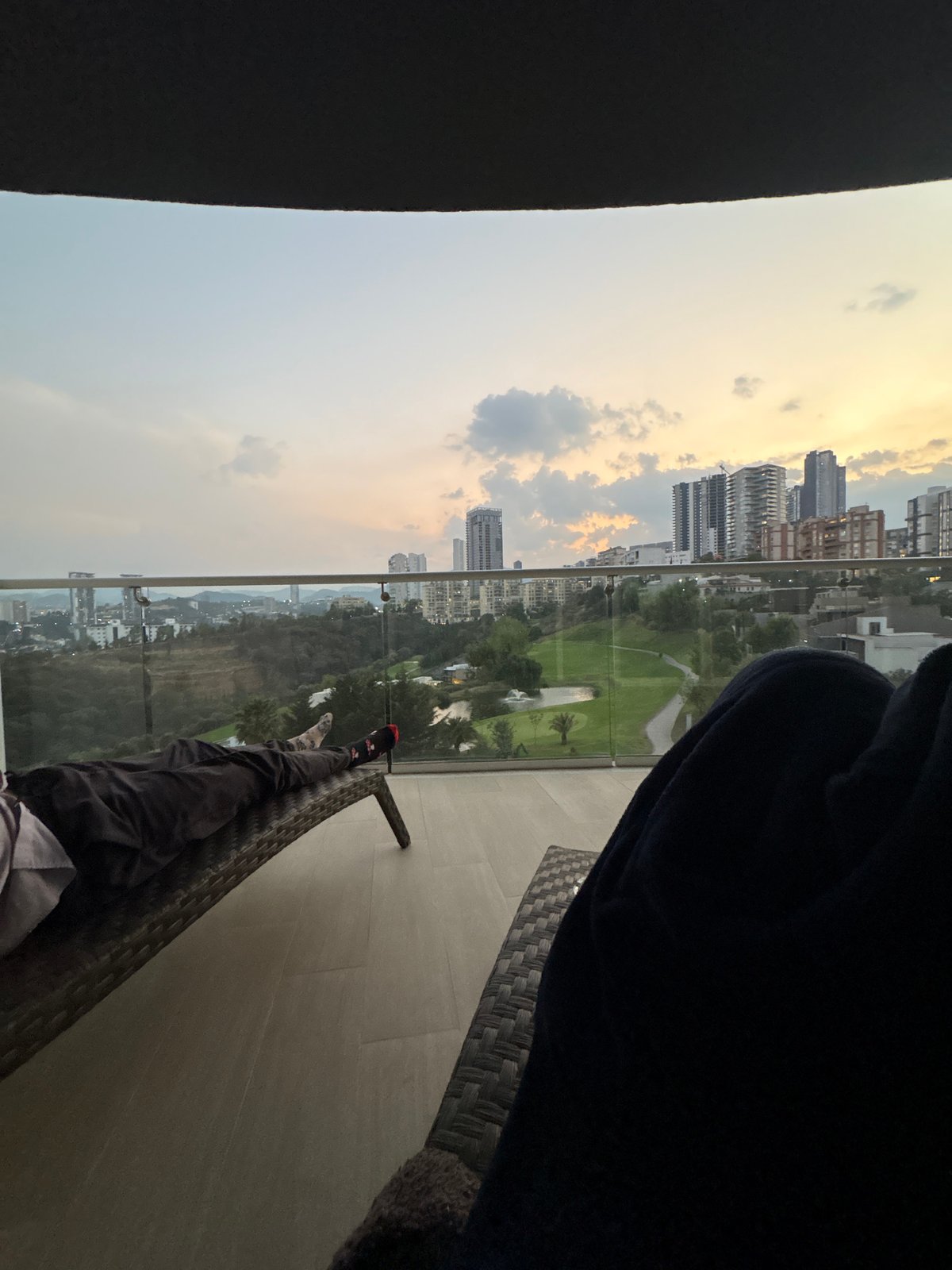 Late night balcony moment captured in Huixquilucan high-rise
