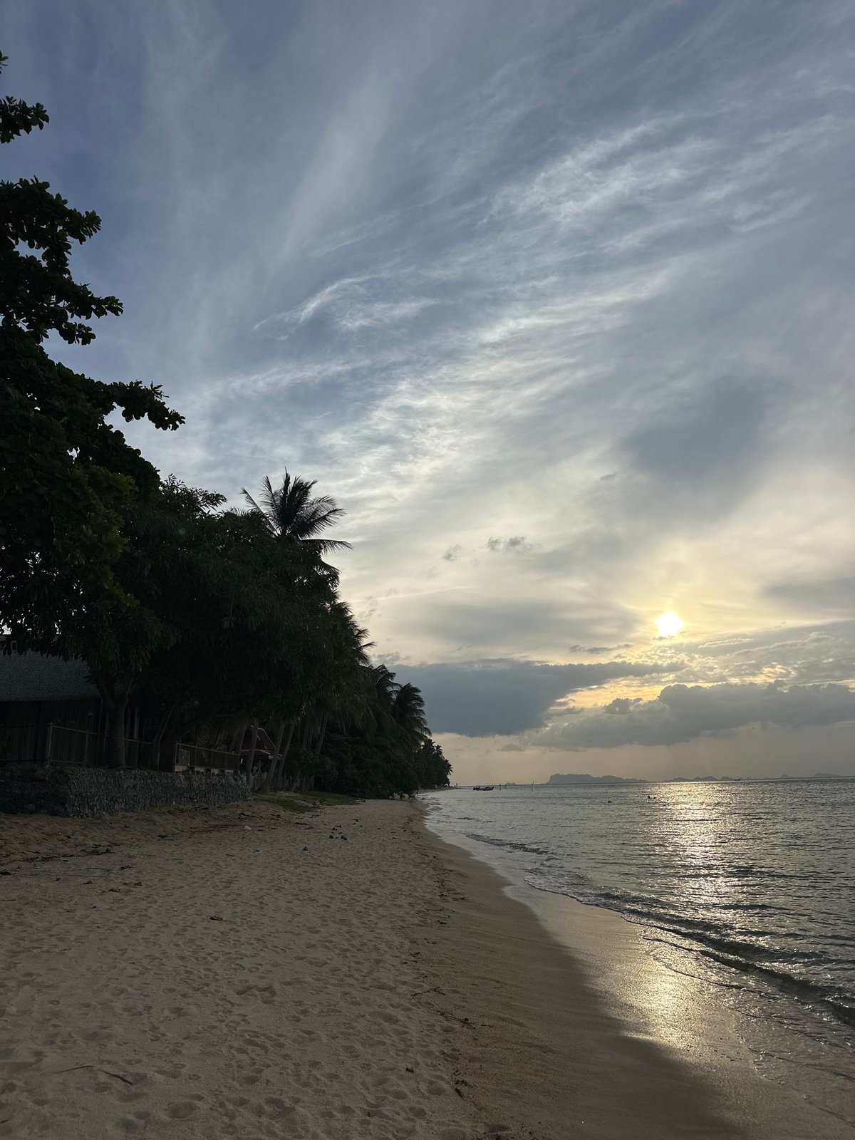 Ko Samui beach scenes: setups, boats, and golden-hour skies