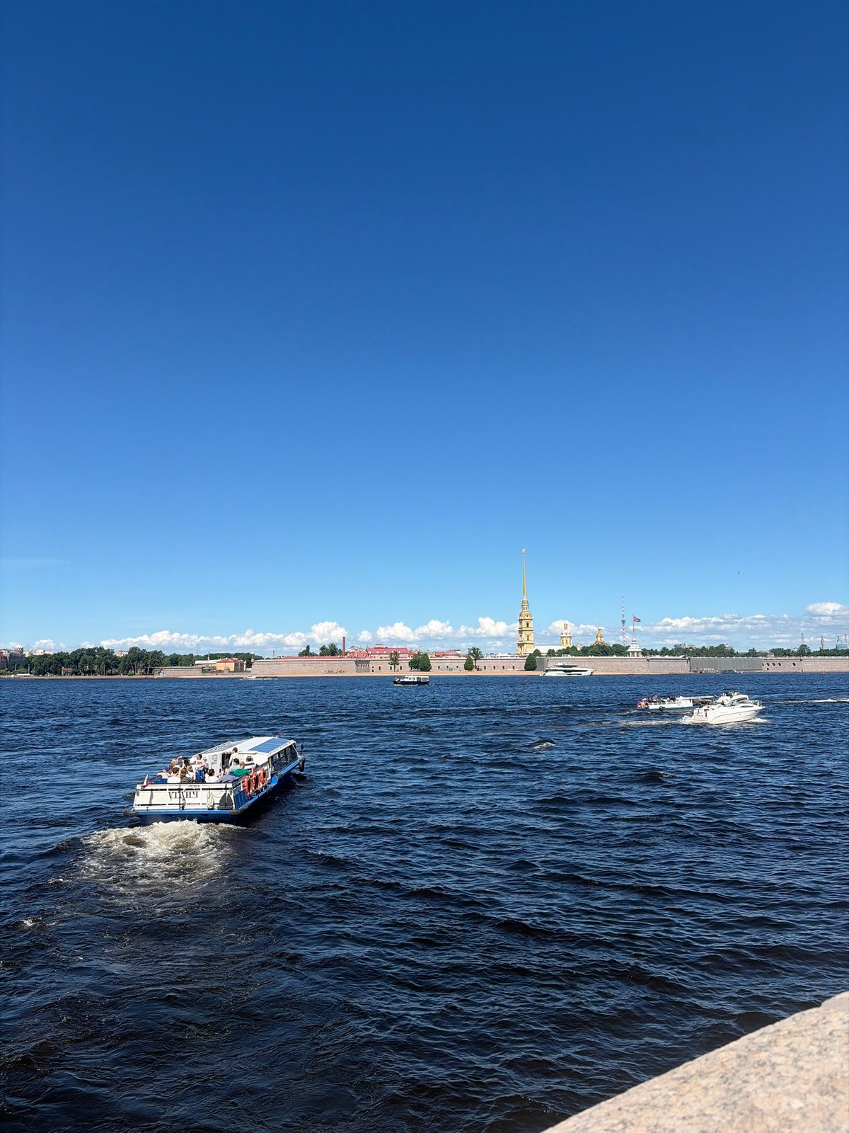 Sunny morning scenes documented along St. Petersburg's Neva River