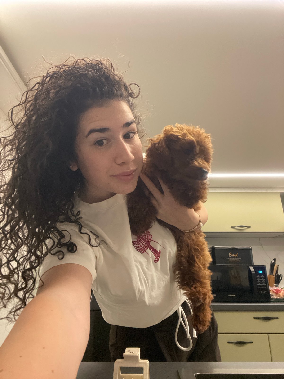 Woman takes early morning selfies with puppy in Sofia