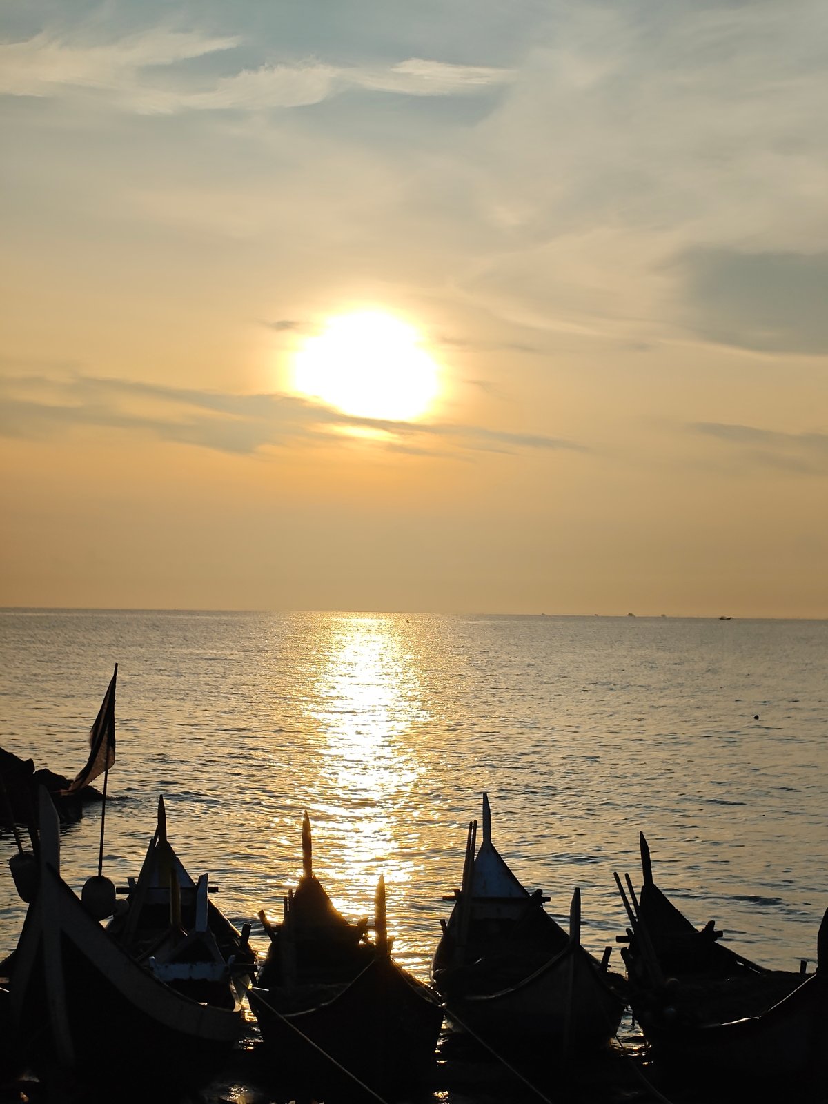 Coastal sunset observed in Lhokseumawe, Indonesia