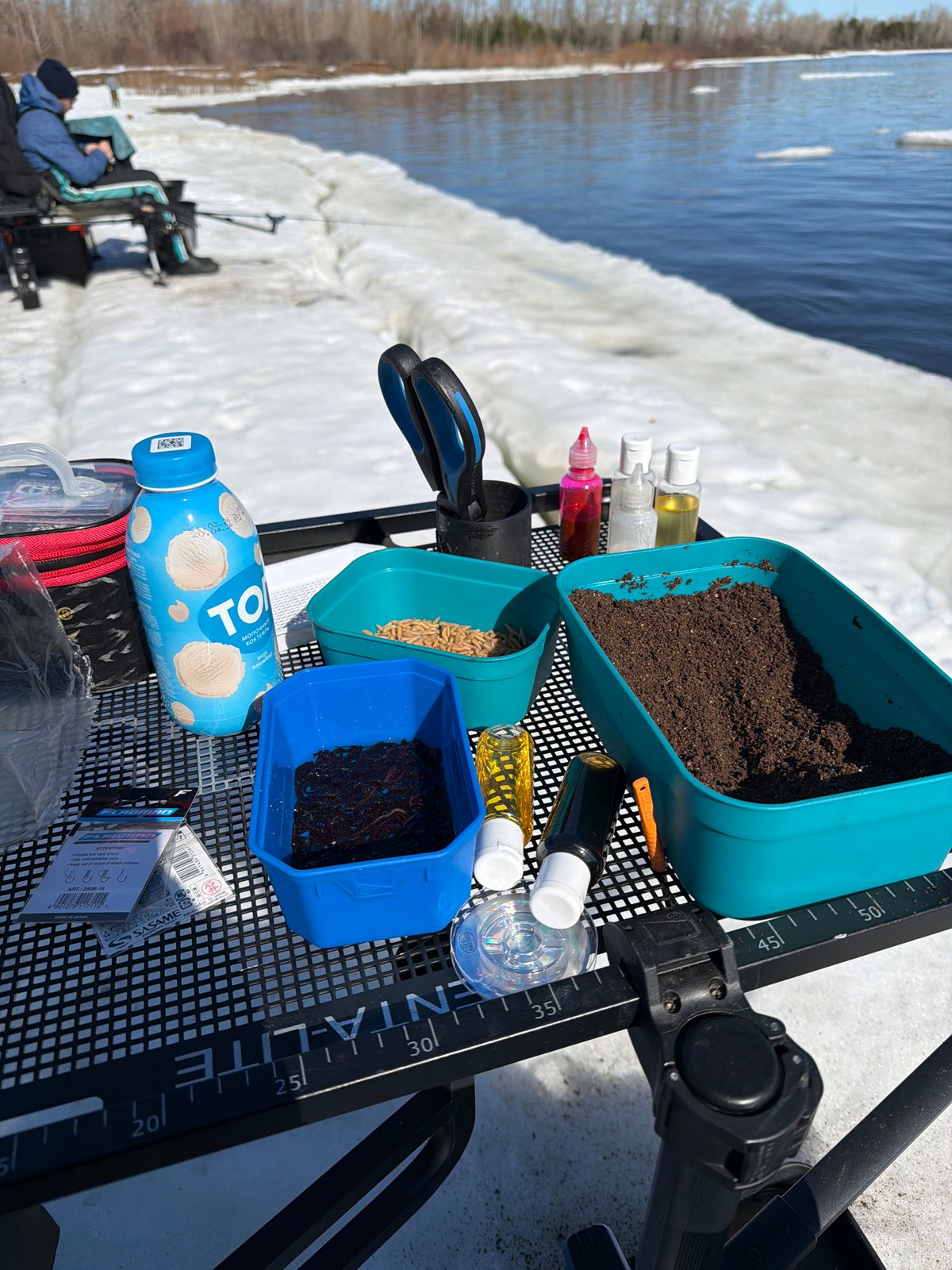 Ice fishing documented in Chaikovsky, Russia during morning hours
