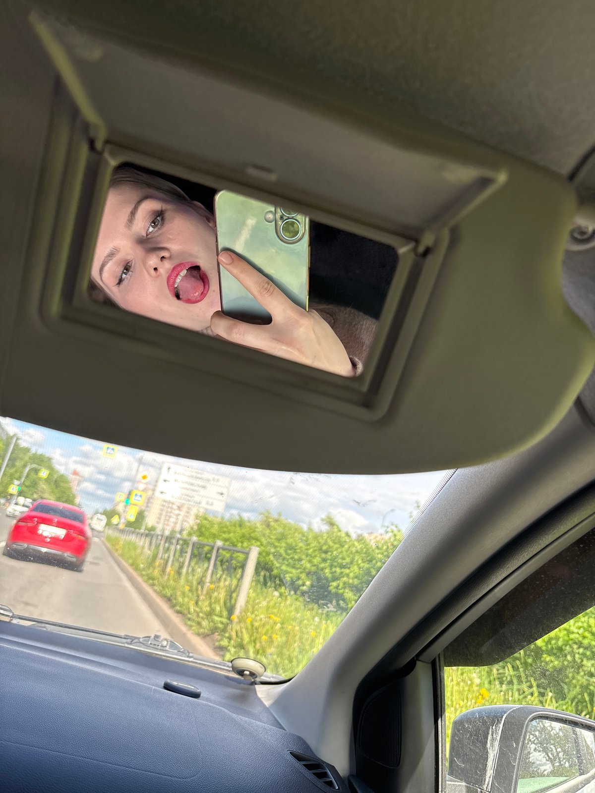 Spring car journey documented through selfies and street scenes