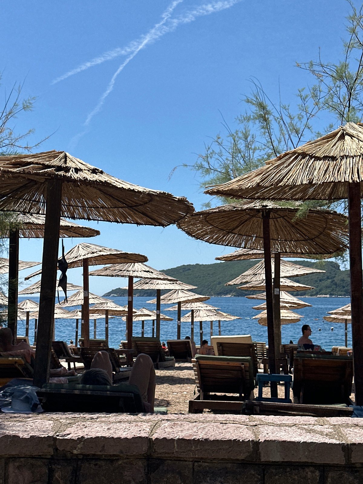 Summer morning on the beaches and waterfront of Budva