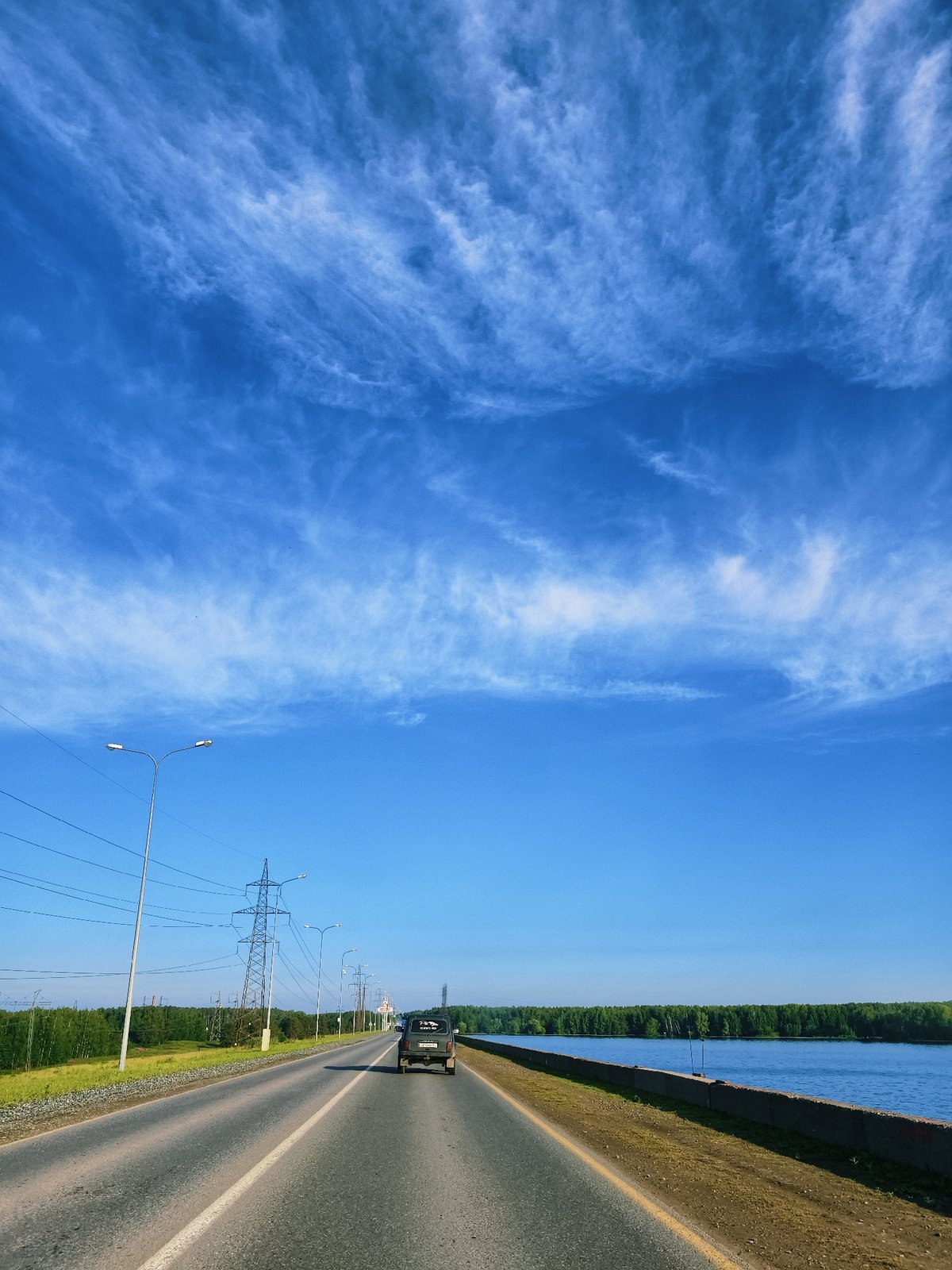 Clear sunny day observed from vehicle in Chaikovsky, Russia