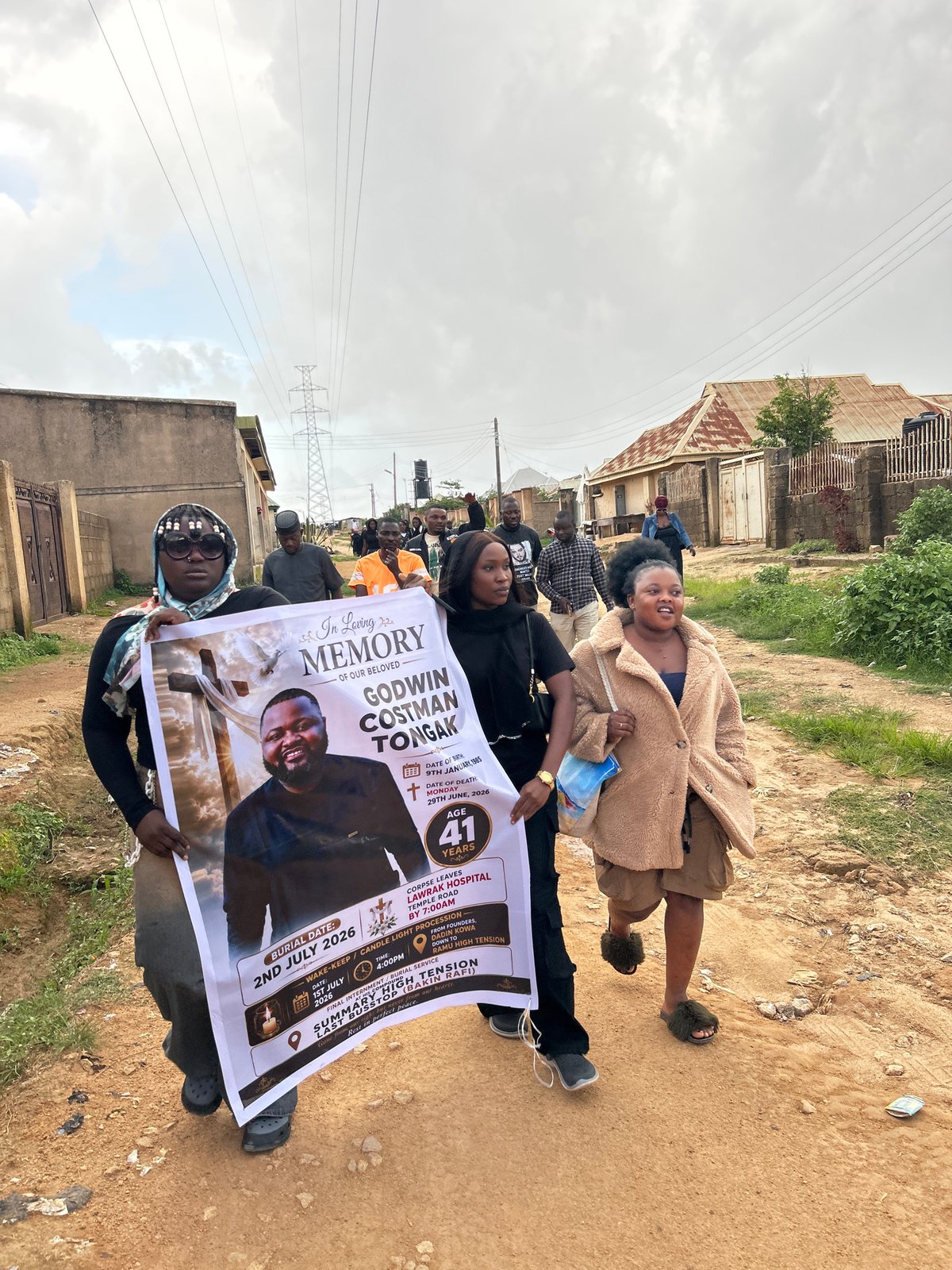 Funeral procession for Godwin Costman Tongak winds through Jos, Nigeria