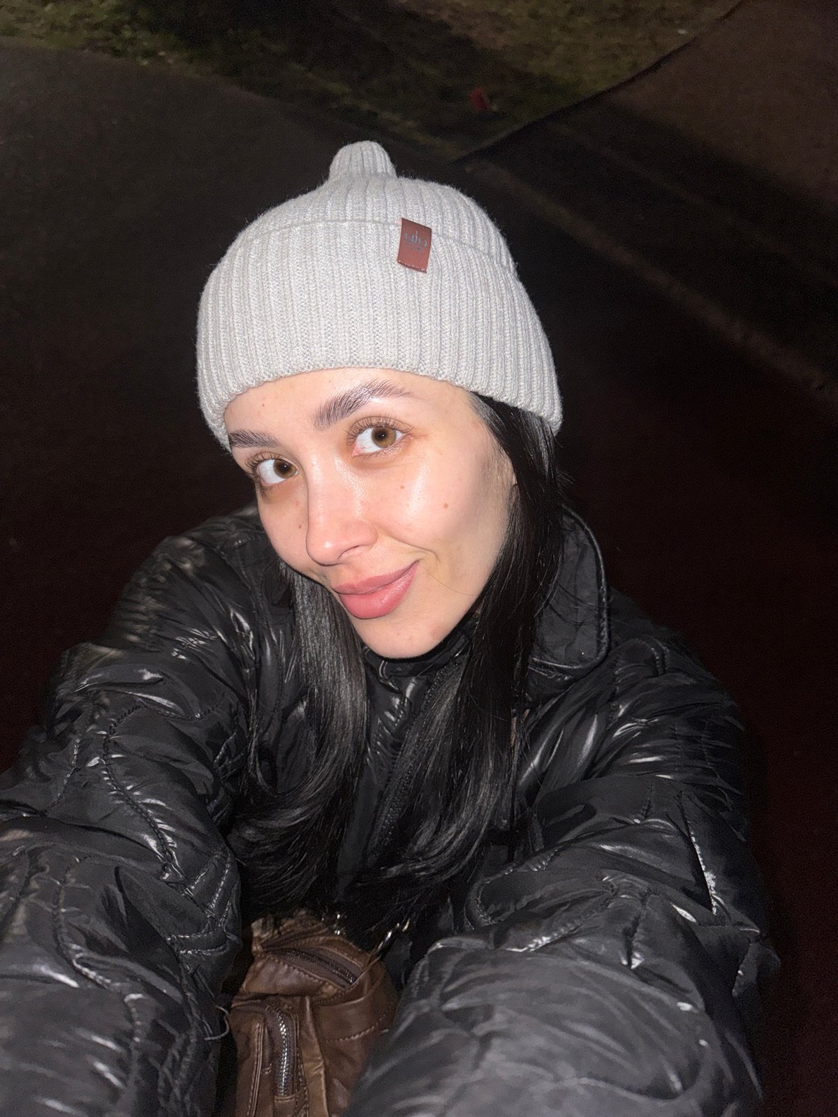 Woman takes playful nighttime selfie in Votkinsk, Russia