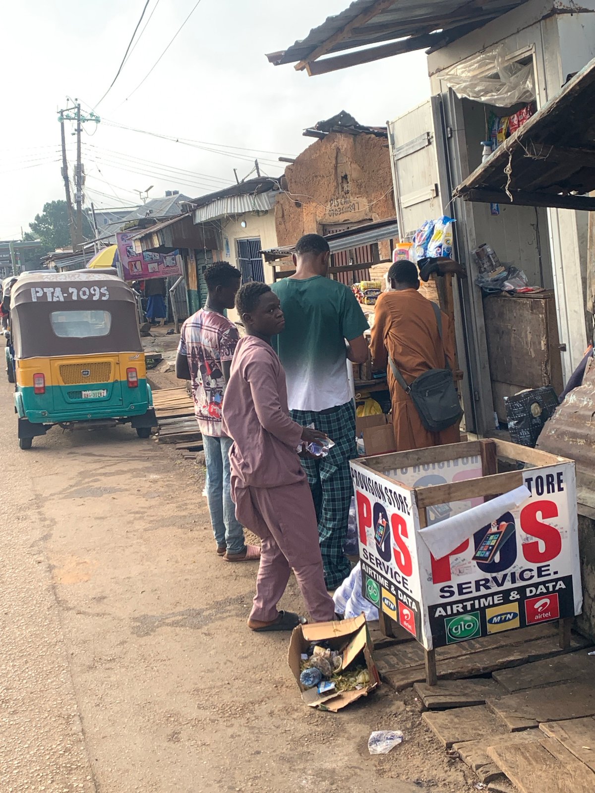 Street activity along a busy Jos–Gura Top corridor
