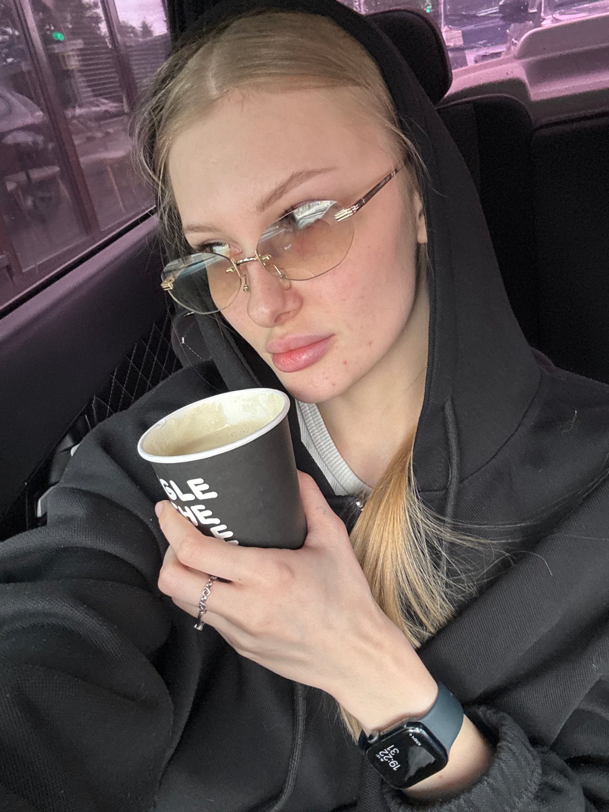Young woman visits coffee shop in Perm, Russia