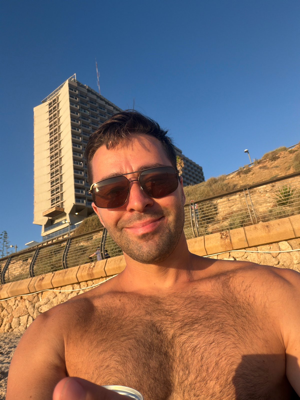 Tel Aviv beach scene with hotel backdrop