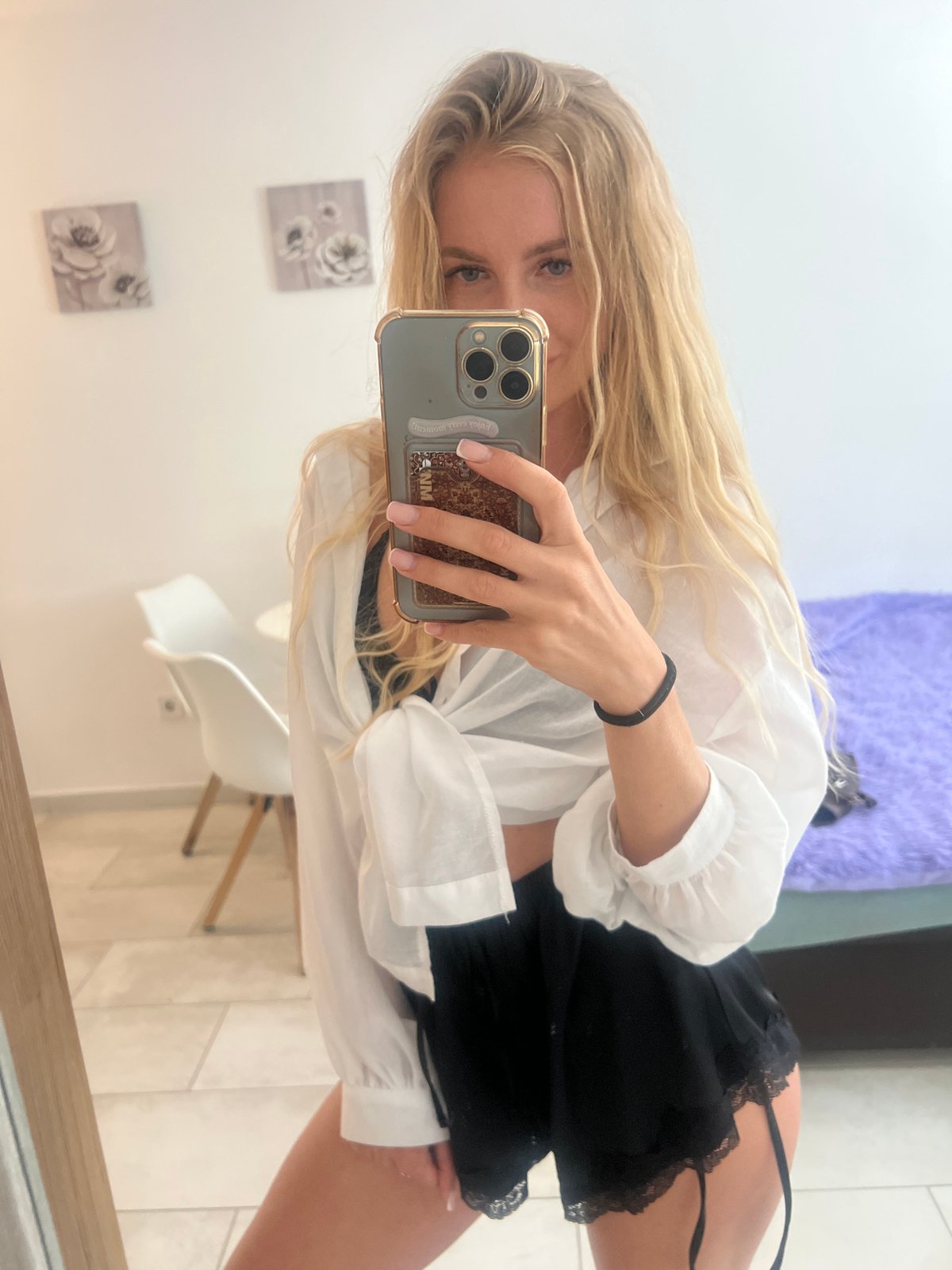 Woman takes mirror selfies in Budva, Montenegro