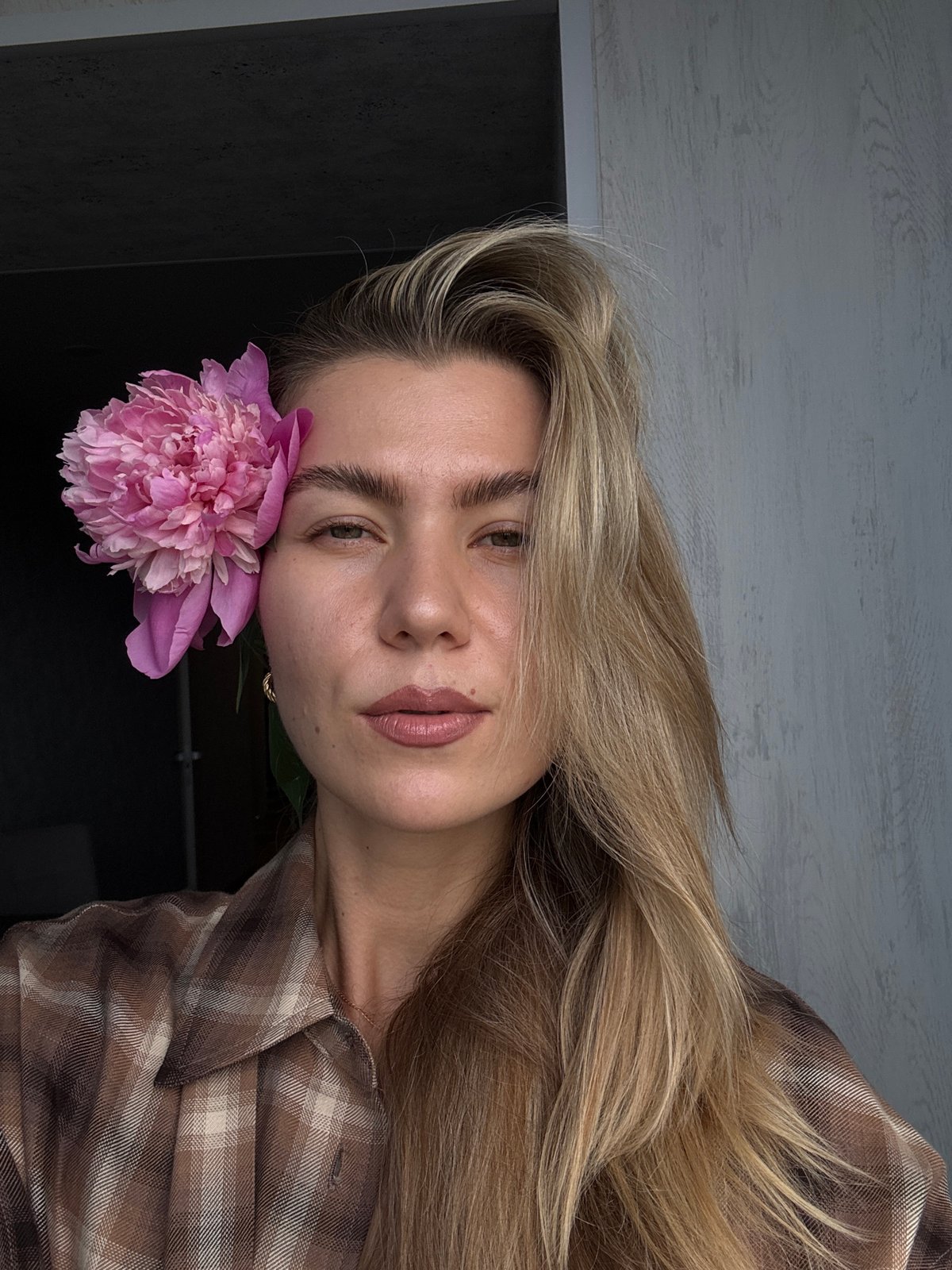 Morning domestic scenes: woman with peonies, Bengal cat, treadmill exercise