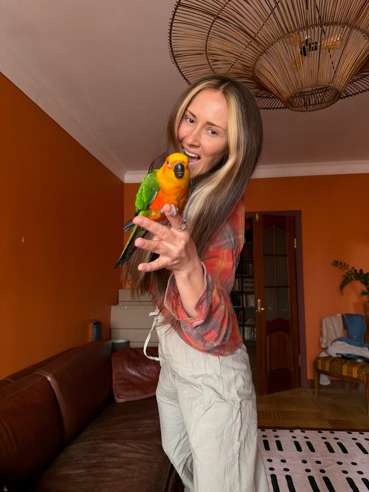 Woman with parrot, flooding documented in Khimki, Russia