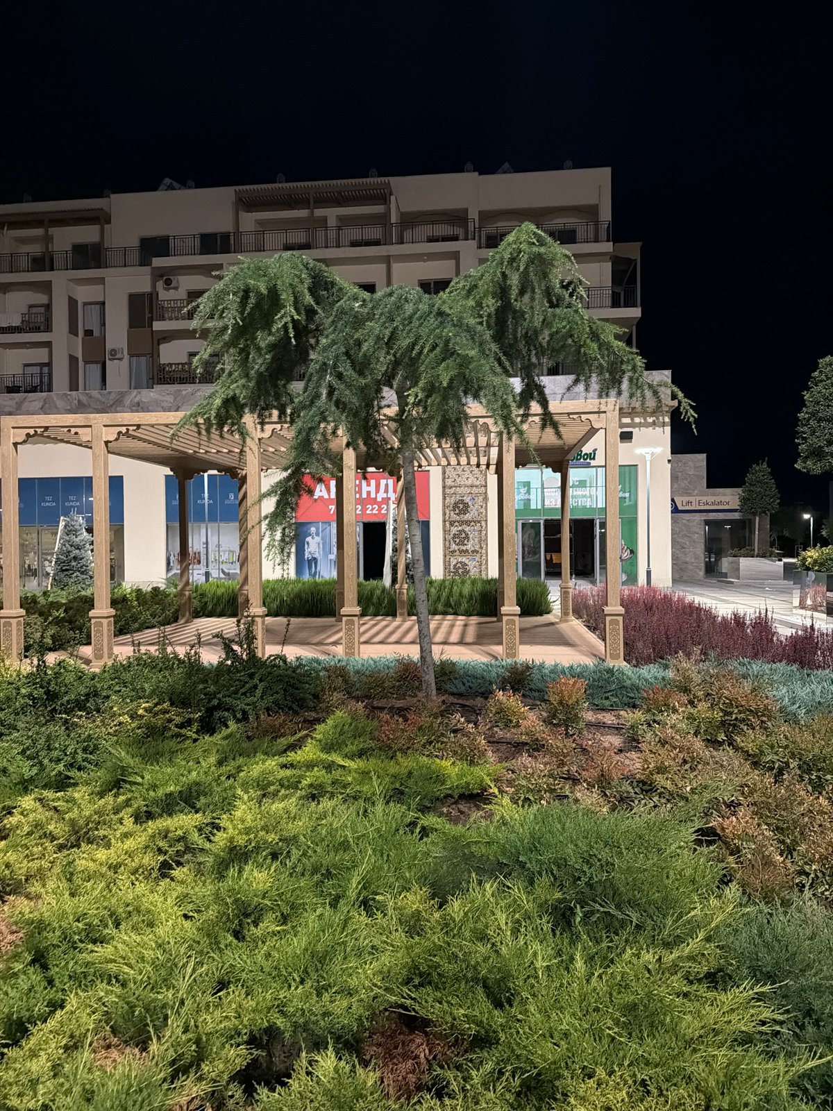 Nighttime scenes around a modern Chinarkent residential complex