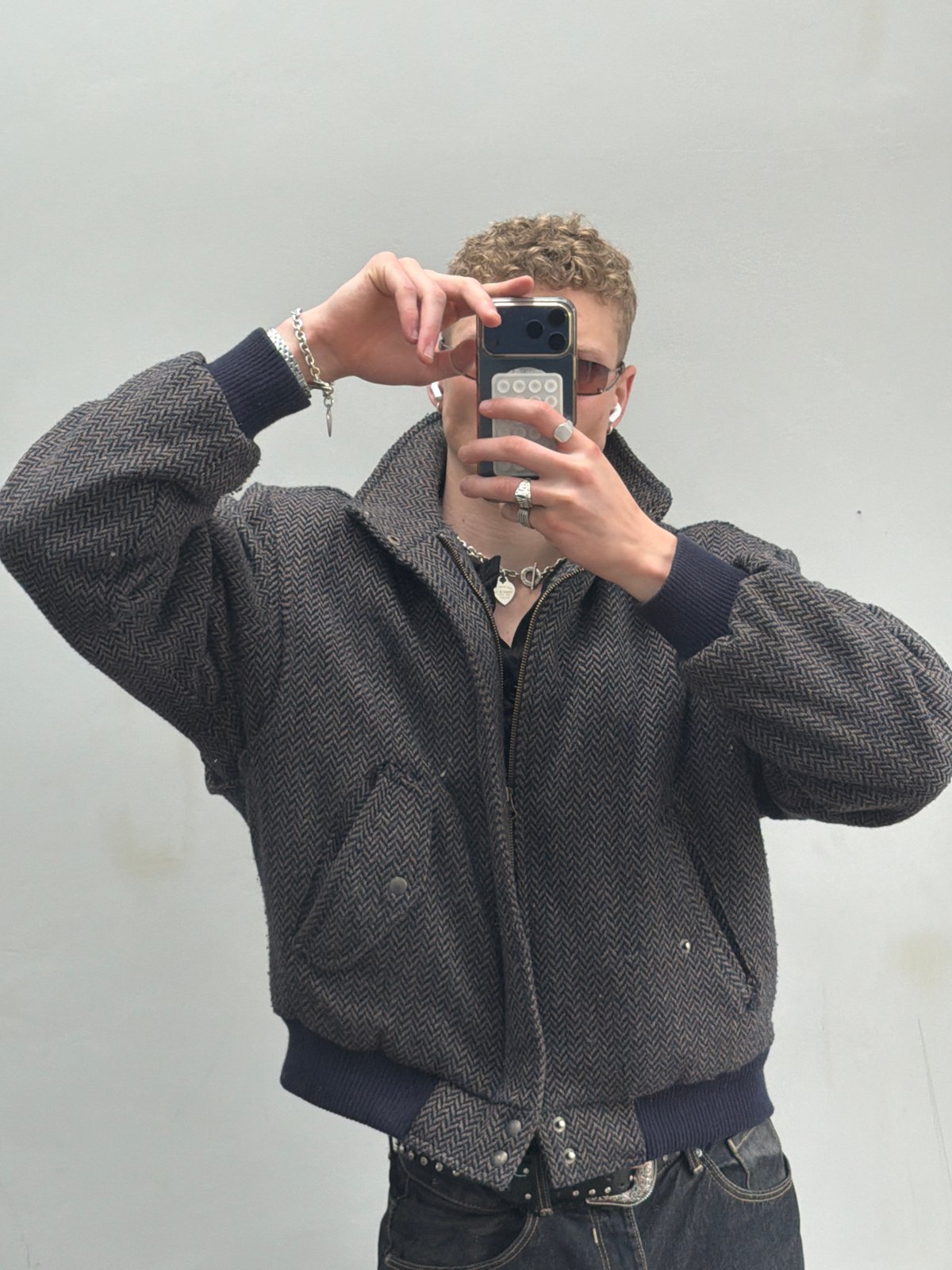 Person takes mirror selfie in London