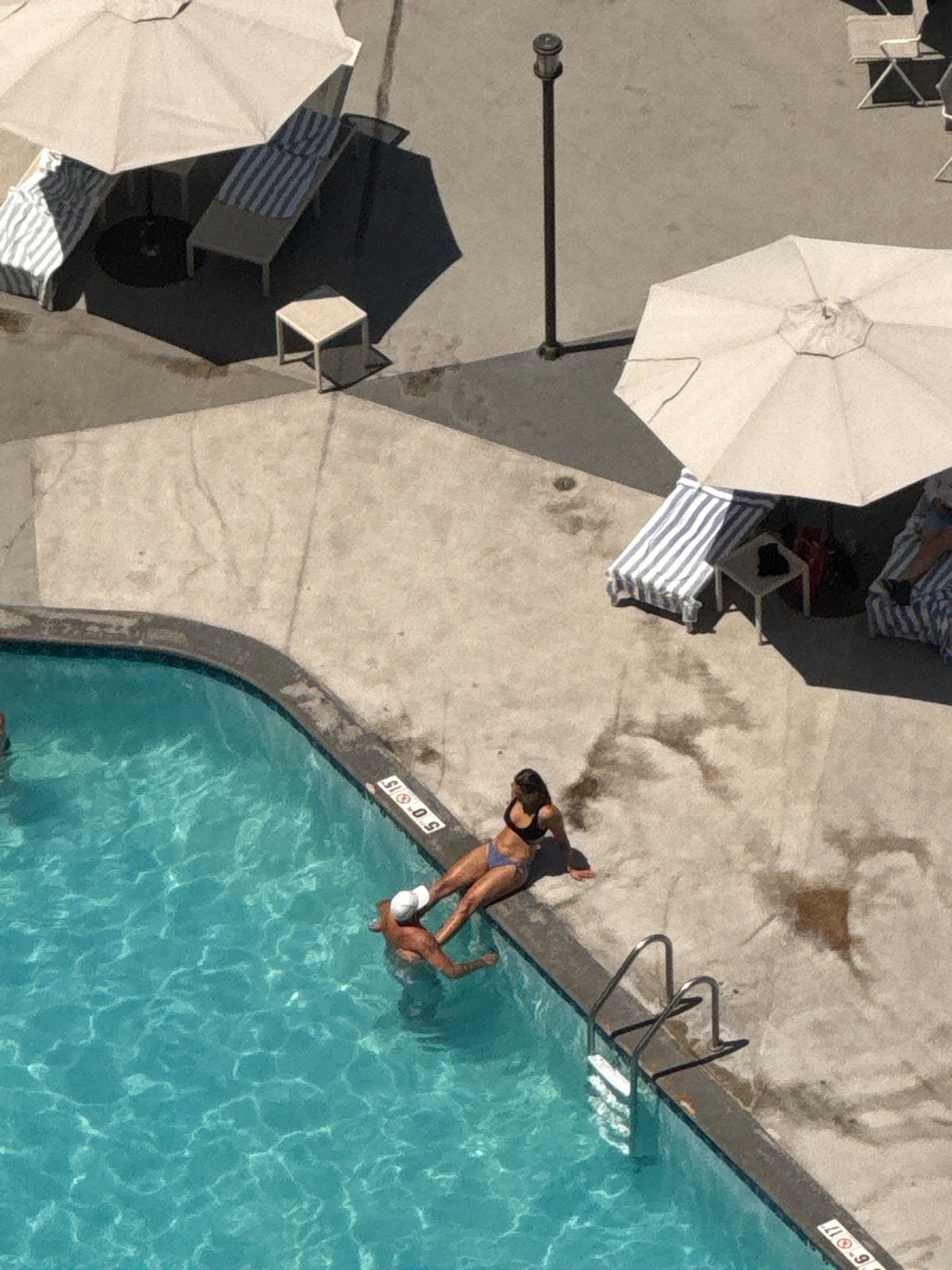 Rooftop pool day in downtown Chicago, summer 2026