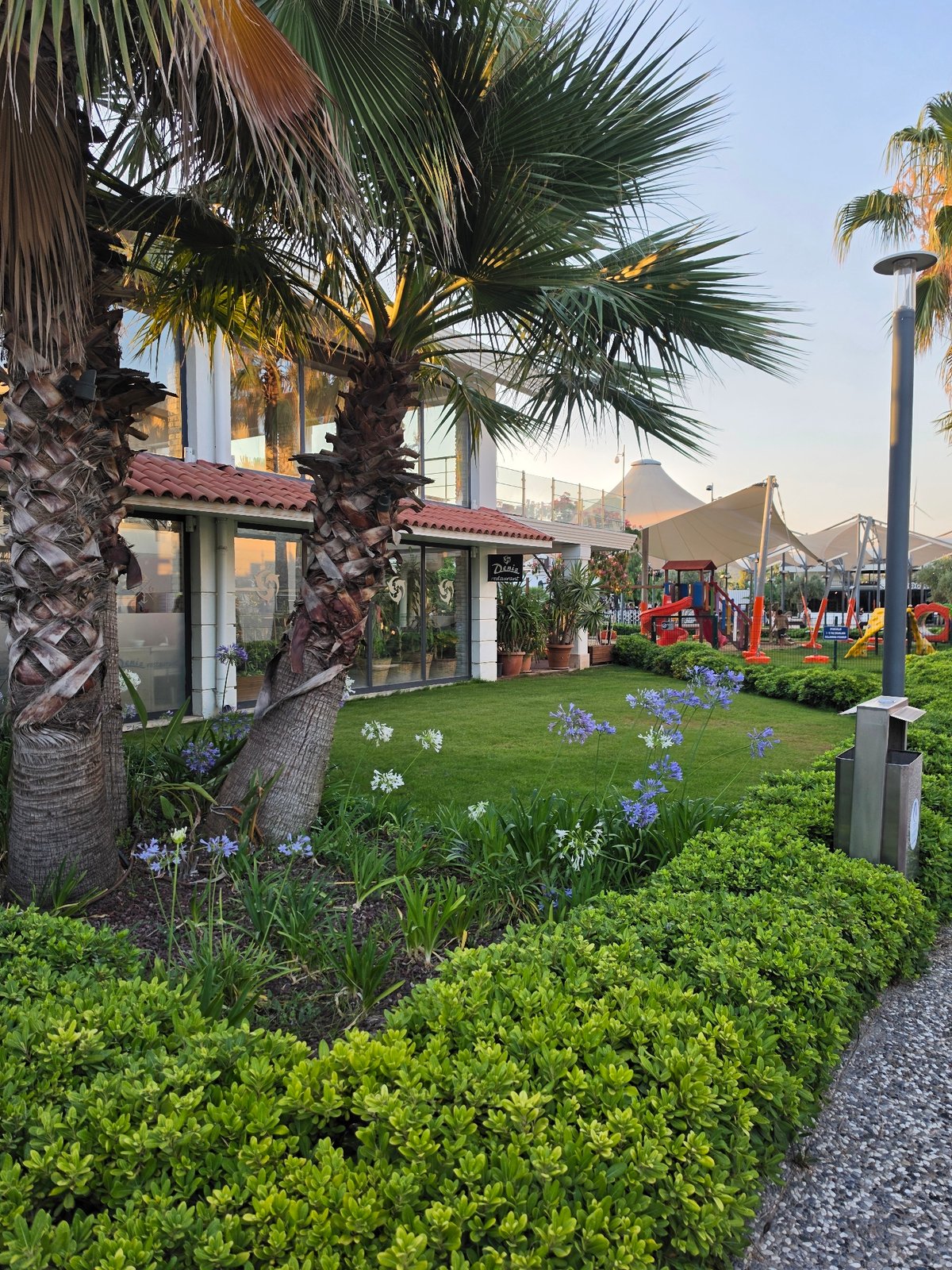 Seferihisar marina and waterfront dining, summer evening