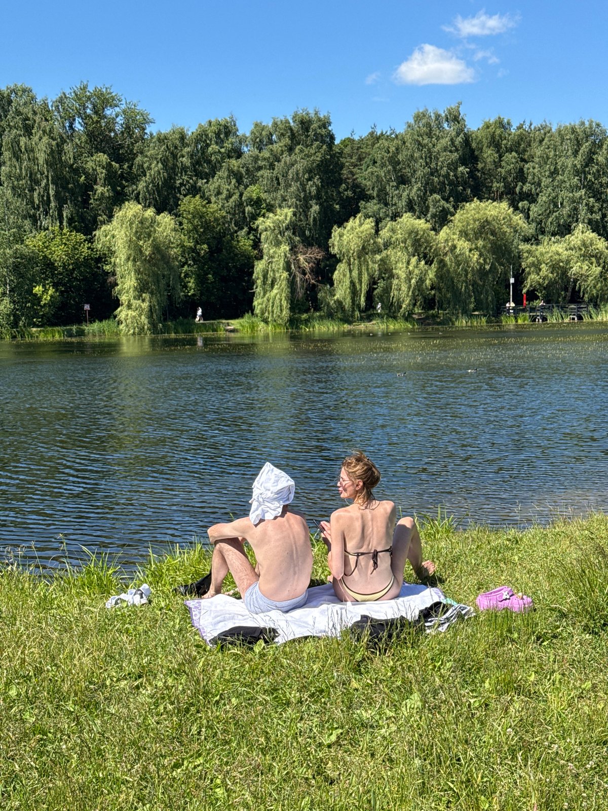 Sunny summer day at Khimki's waterfront parks and promenades