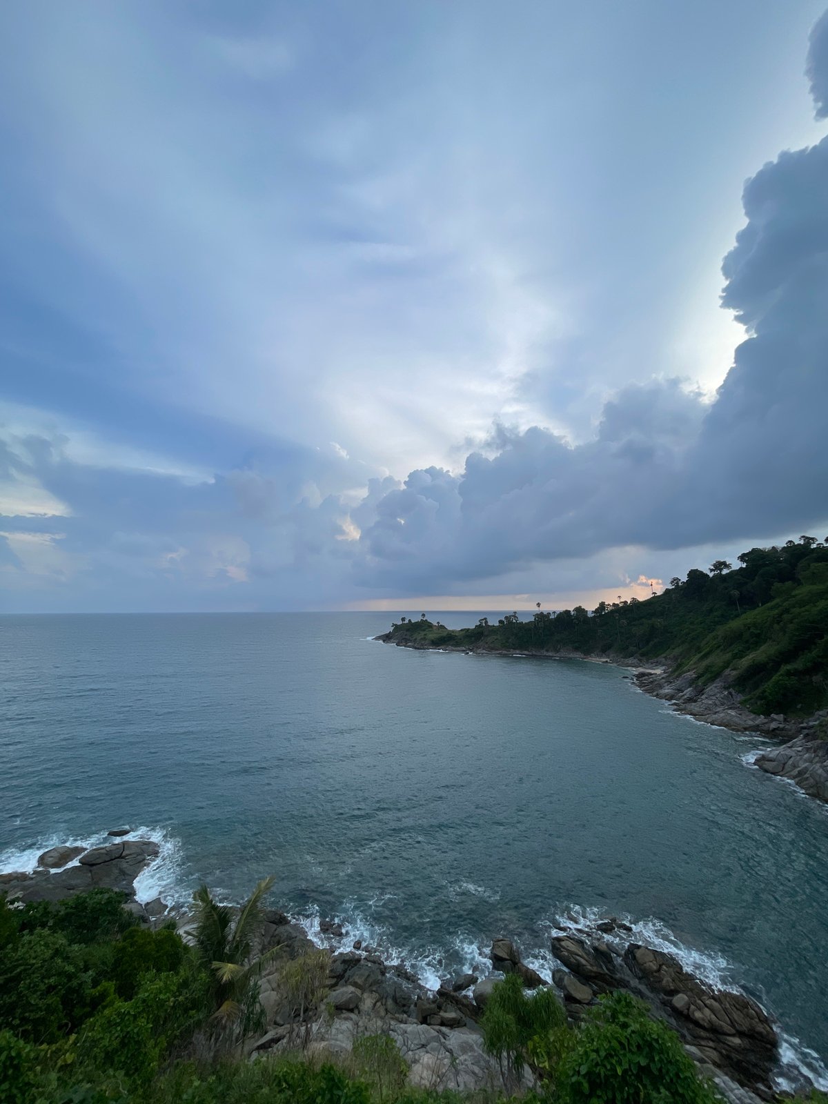 Rocky coastline and island views along Rawai's shore