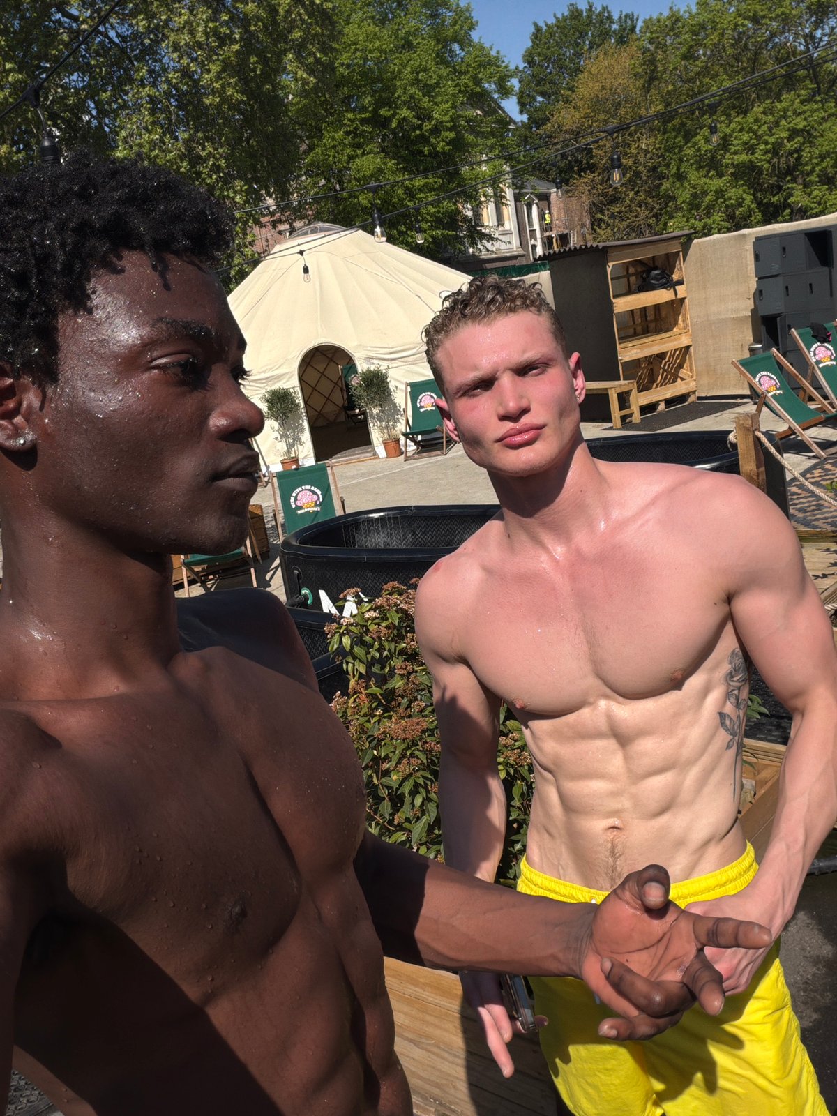 Two men sunbathe, take selfies on London rooftop