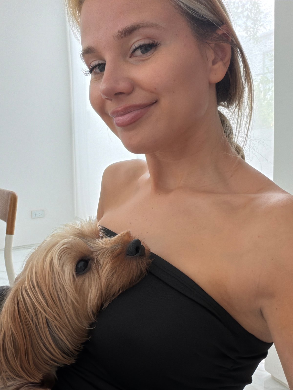 Chess game and a Yorkshire Terrier on a Thep Krasatti morning